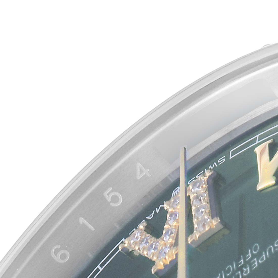 This close-up image shows the bezel and part of the dial, focusing on the Roman numeral "VI" of the Rolex Datejust 126233 Men's Steel and Gold (two tone) Green Dial 126233 Men's Steel and Gold (two tone) Green Dial watch.