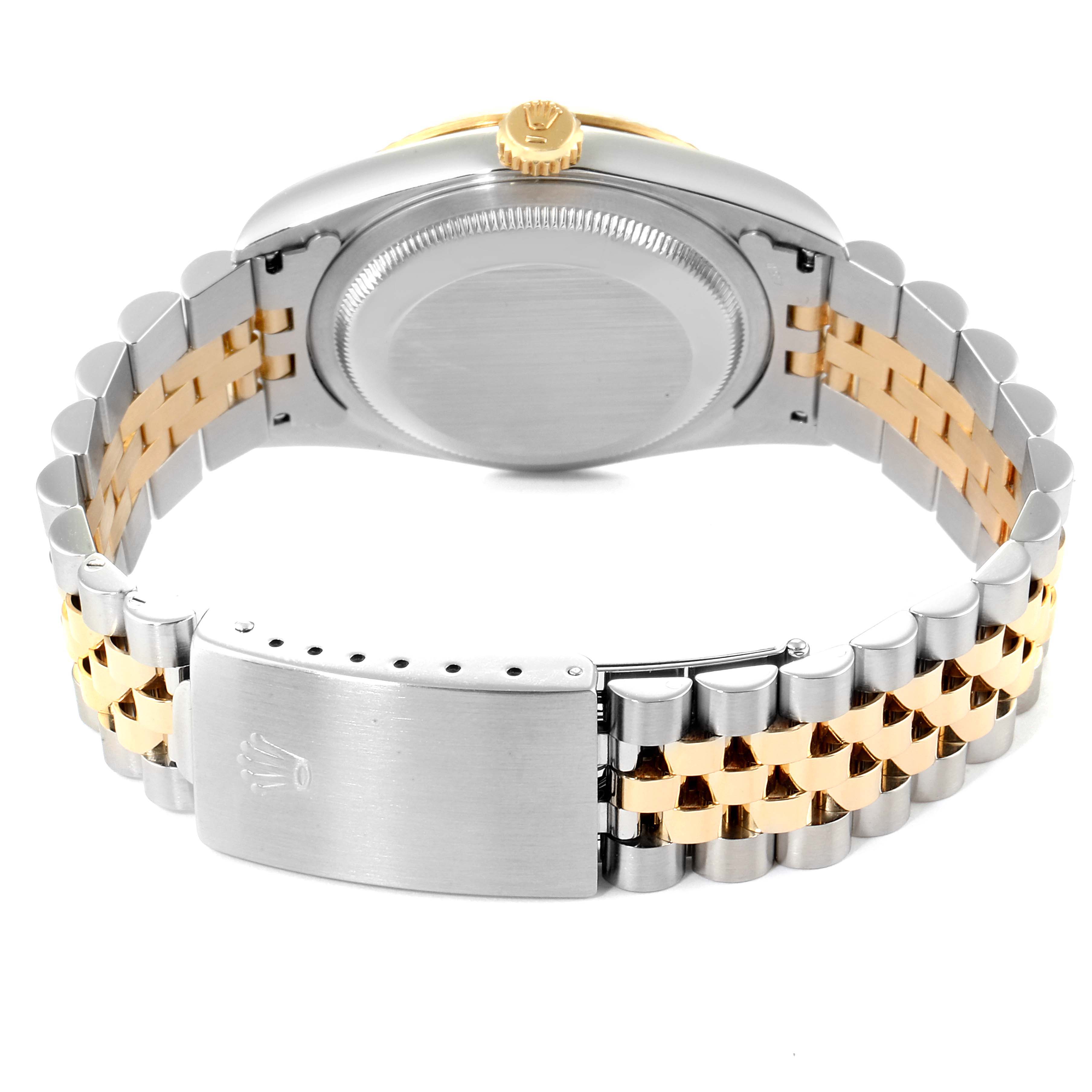 This image shows the back side of a Rolex Datejust 16233 Men
s Steel and Gold (two tone) White Dial 16233 Men
s Steel and Gold (two tone) White Dial watch, highlighting the clasp, case back, and two-tone bracelet.