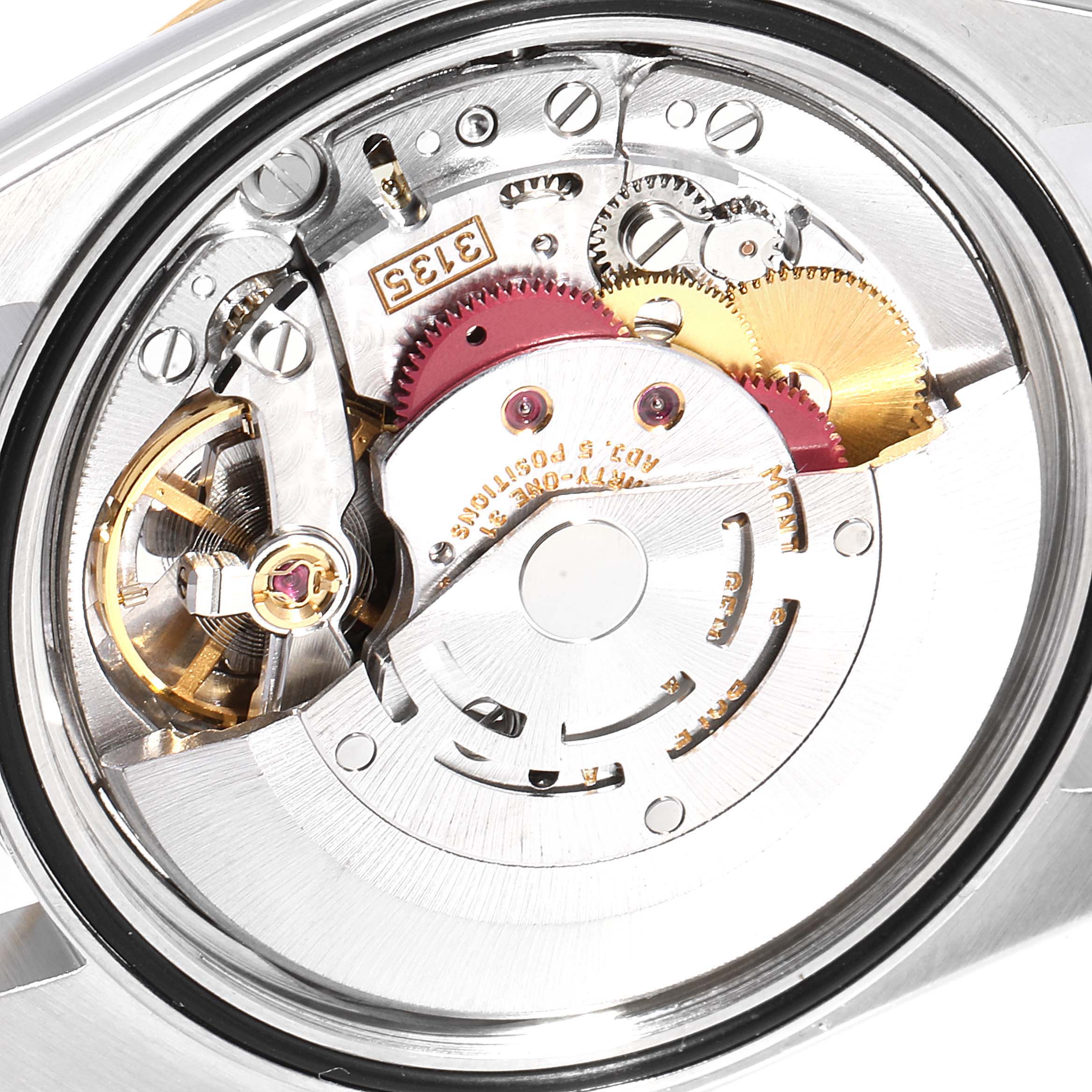 The image shows the intricate movement and internal mechanics of the Rolex Datejust 16233 Men
s Steel and Gold (two tone) White Dial 16233 Men
s Steel and Gold (two tone) White Dial watch from the back.