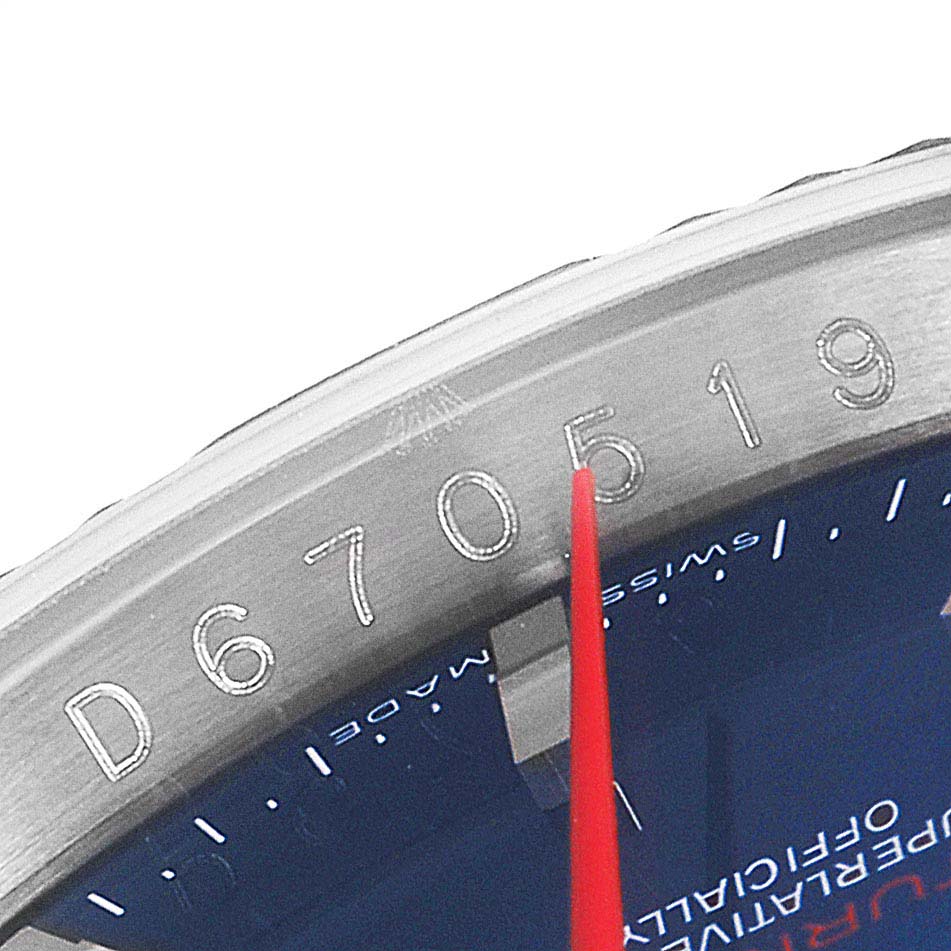 This close-up angle of the Rolex Turn-o-Graph 116264 Men
s Stainless Steel Blue Dial 116264 Men
s Stainless Steel Blue Dial watch shows the bezel and part of the dial with the red second hand.