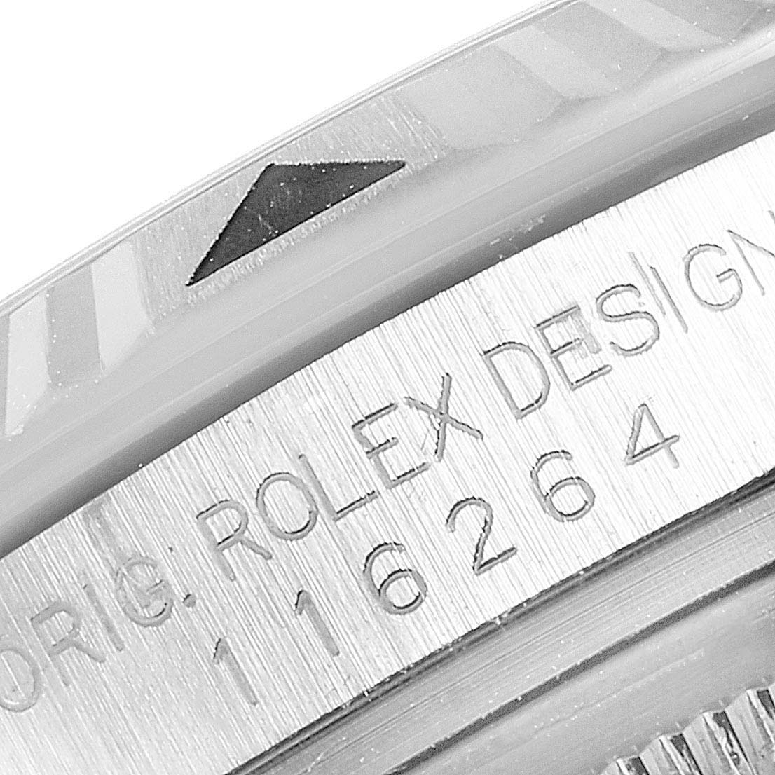 The image shows the bezel and engraved case side of a Rolex Turn-o-Graph 116264 Men
s Stainless Steel Blue Dial 116264 Men
s Stainless Steel Blue Dial model with the reference number 116264.