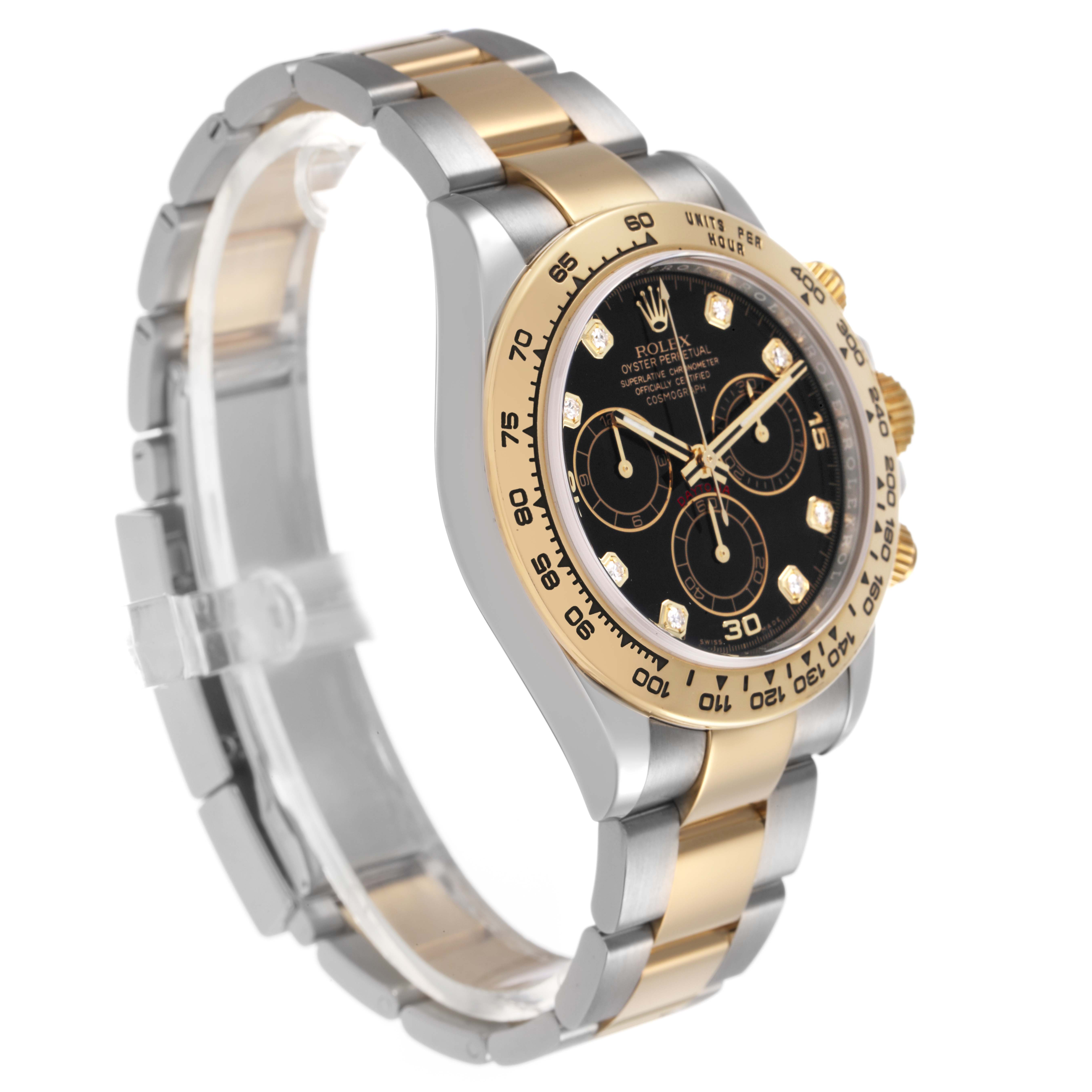 The Rolex Daytona 116503 Men's Steel and Gold (two tone) Black Dial is shown at a slight angle from the top right, revealing its black dial, gold bezel, and two-tone bracelet.