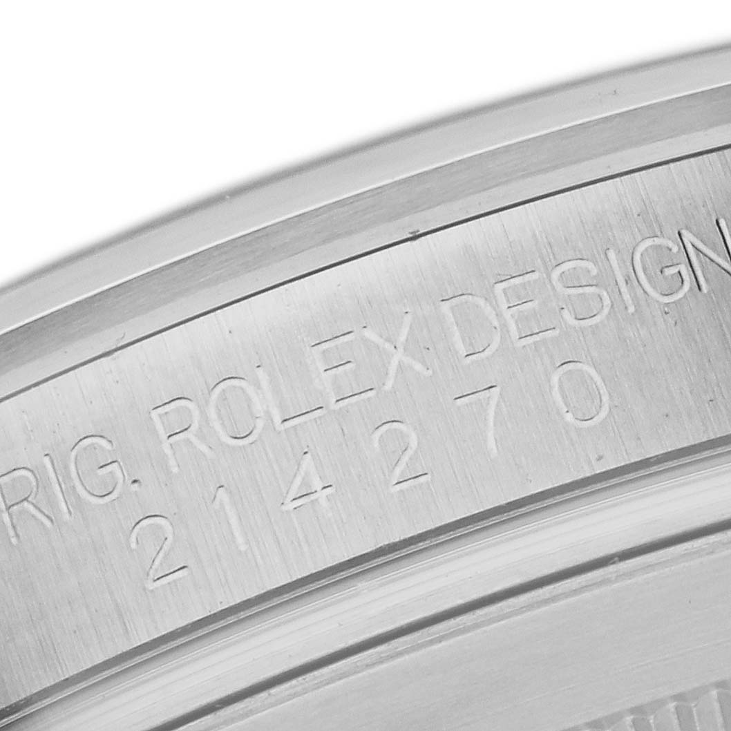This close-up of the Rolex Explorer 214270 Men's Stainless Steel Black Dial 214270 Men's Stainless Steel Black Dial model shows the engraved model number "214270" on its case.