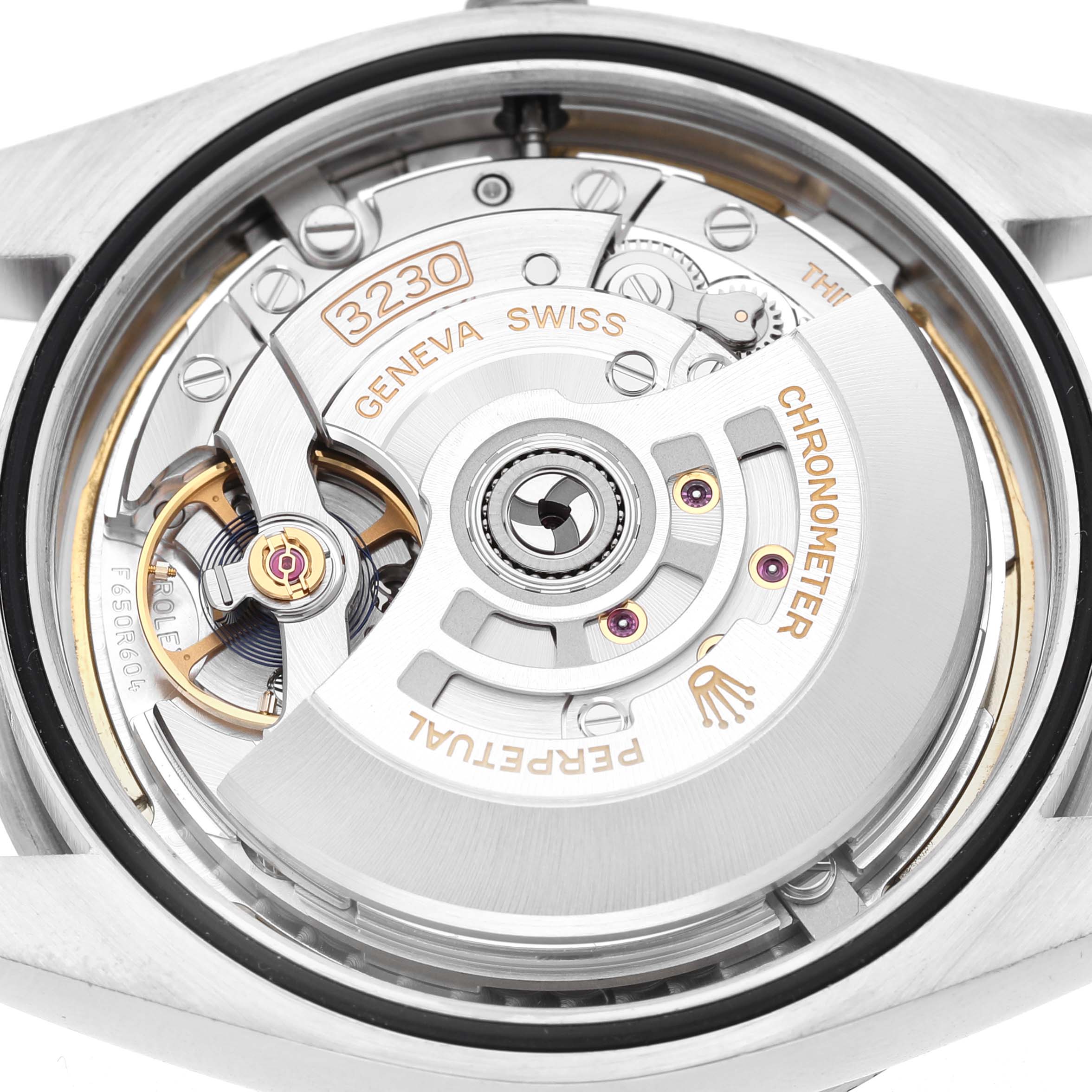 The image shows the Rolex Explorer 224270 Men's Stainless Steel Black Dial watch movement from the back, highlighting its intricate mechanical components.