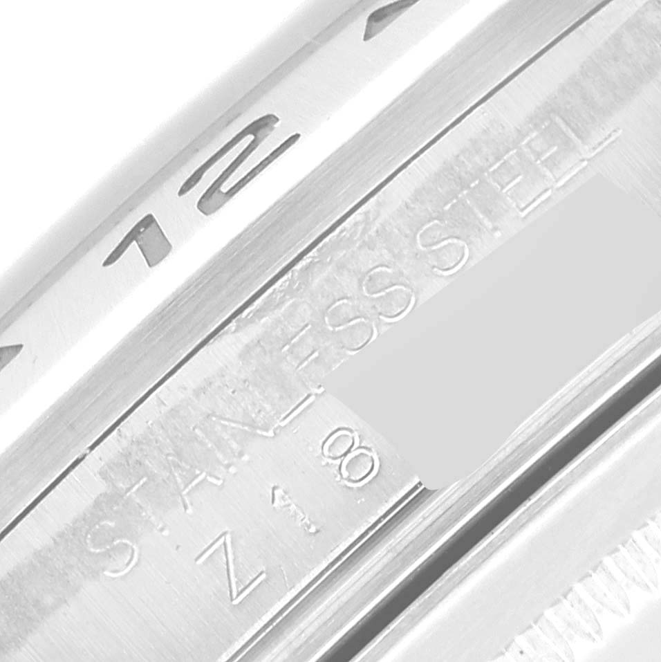 This close-up image shows the engraved numbers and markings on the bezel and case of the Rolex Explorer 16570 Men
s Stainless Steel Black Dial 16570 Men
s Stainless Steel Black Dial watch.
