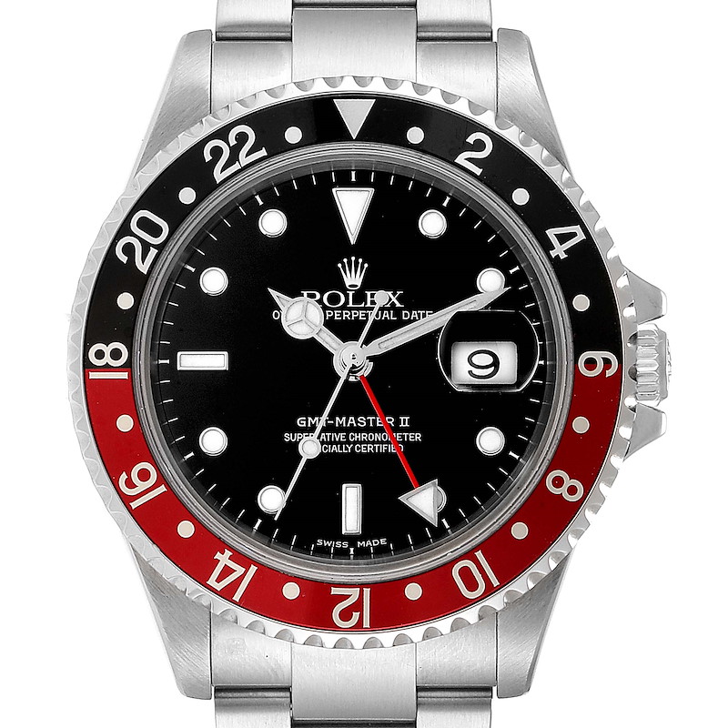 The Rolex GMT-Master watch is shown from a front angle, displaying its dial, bezel, date, and part of the bracelet.