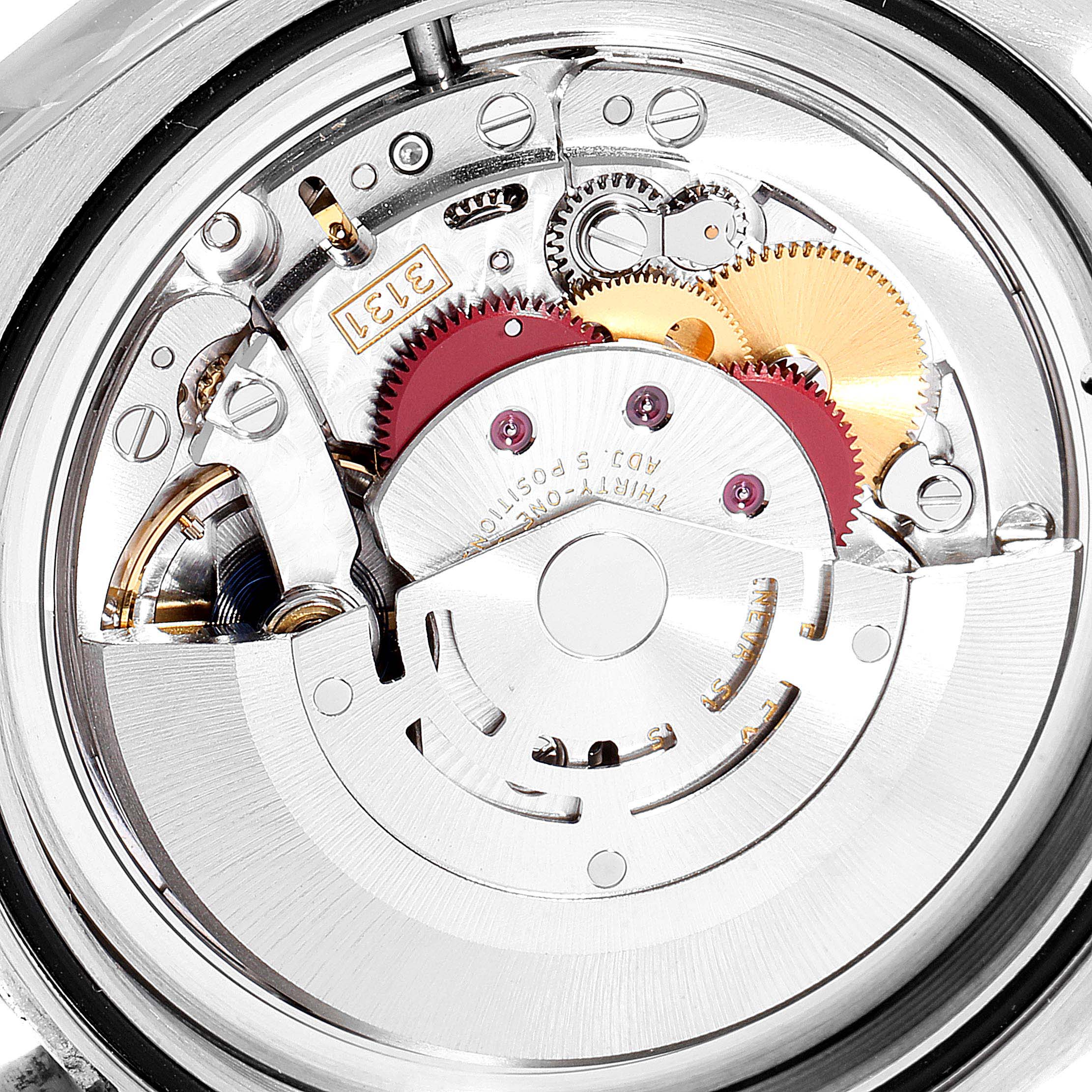 This is an internal view of the Rolex Milgauss 116400 Men's Stainless Steel Black Dial 116400 Men's Stainless Steel Black Dial watch movement, showcasing gears and mechanical components.