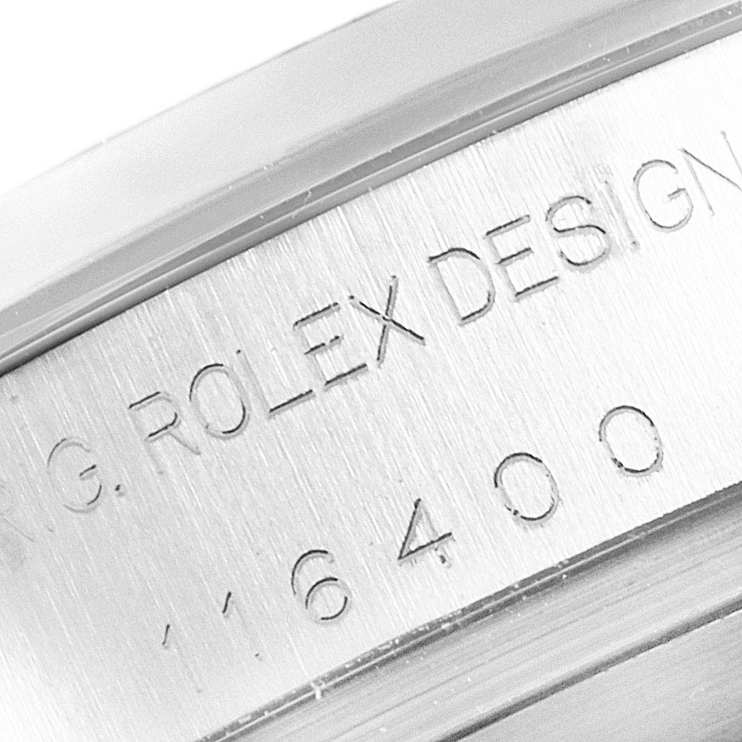 Close-up of the engraving on the side of a Rolex Milgauss 116400 Men's Stainless Steel Black Dial 116400 Men's Stainless Steel Black Dial watch case, showing "ROLEX DESIGN" and the model number.