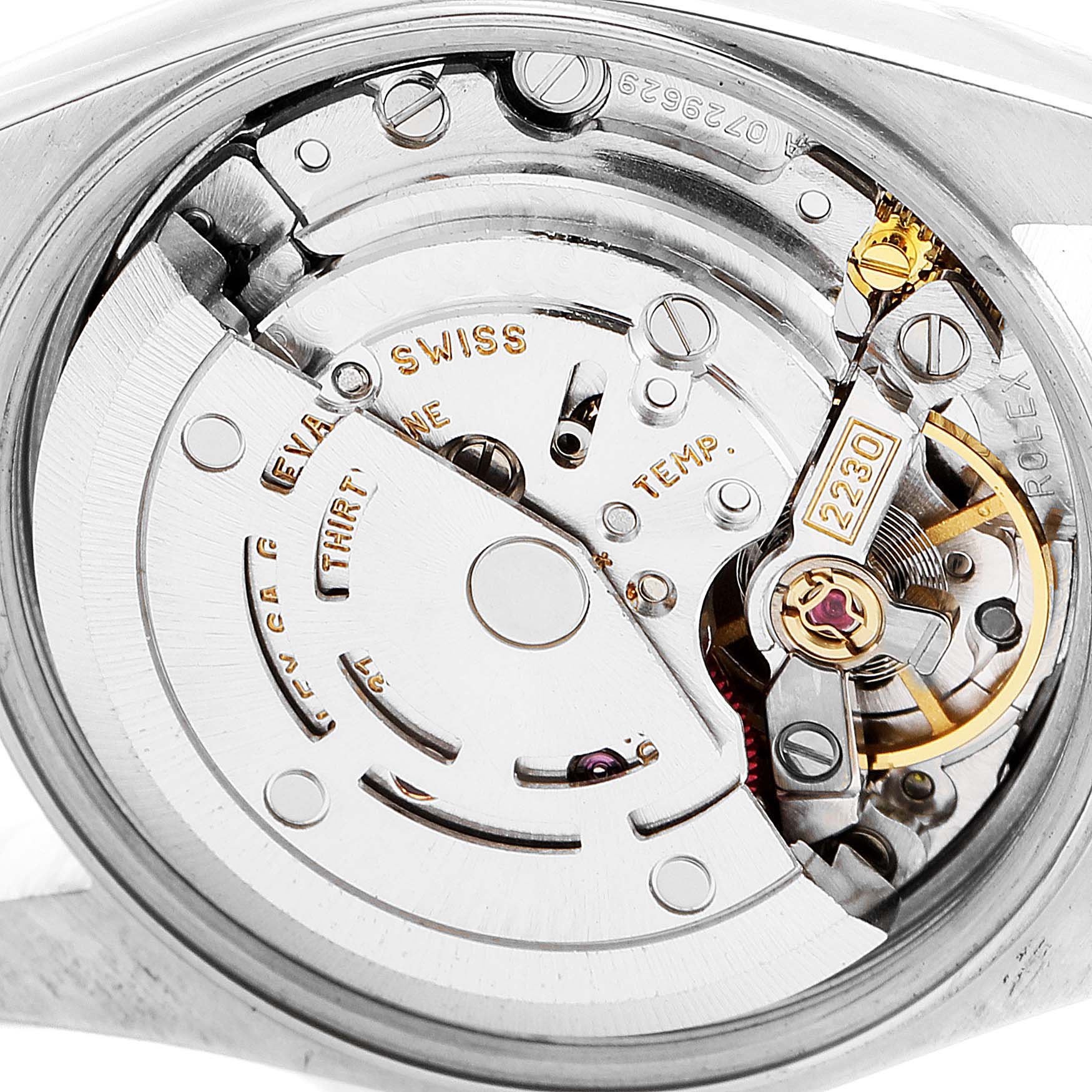 The image shows the internal mechanical movement of a Rolex Oyster Perpetual 76094 Women's Stainless Steel Pink Dial 76094 Women's Stainless Steel Pink Dial watch from a close-up, top-down angle.