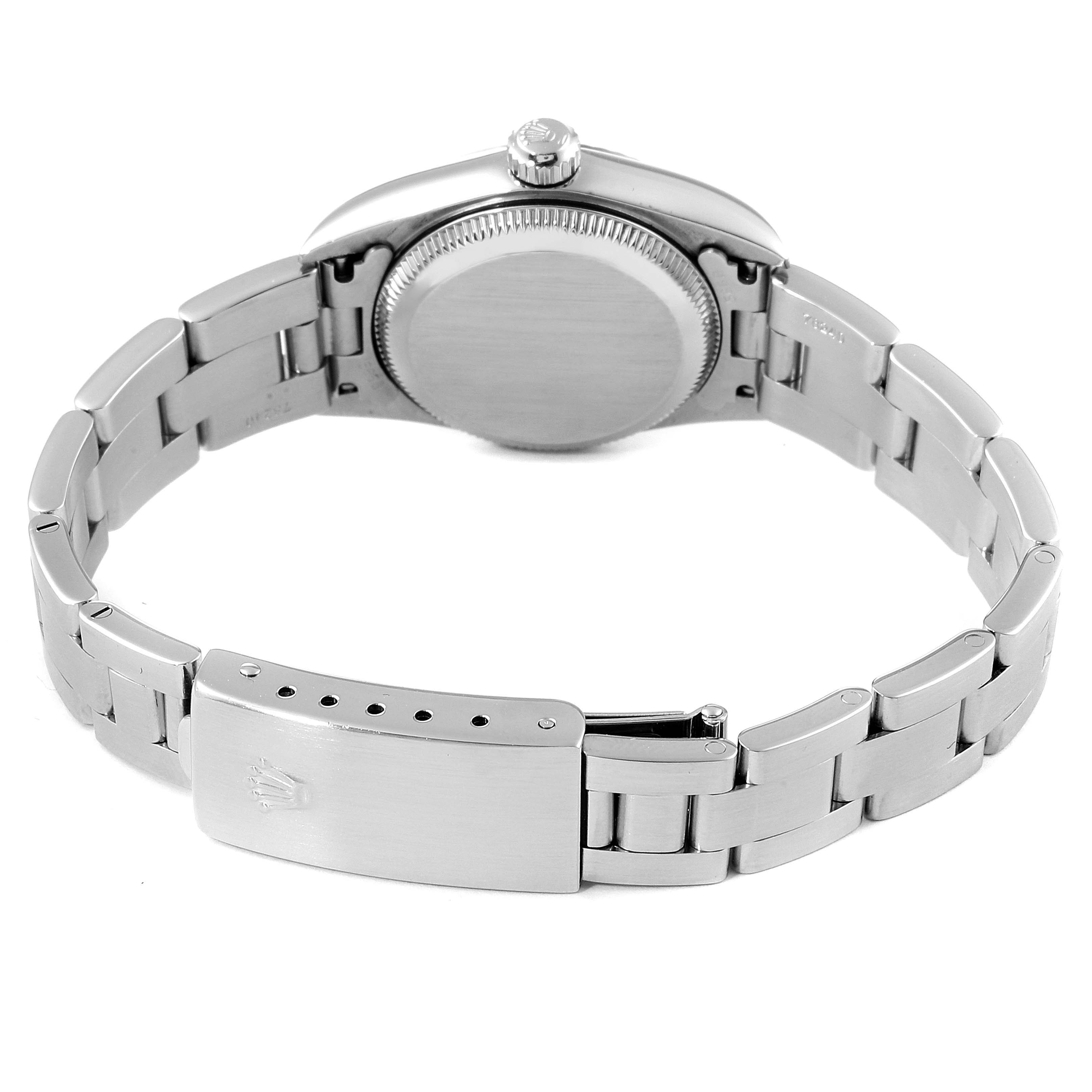 This image shows the back view of a Rolex Oyster Perpetual 76094 Women's Stainless Steel Pink Dial 76094 Women's Stainless Steel Pink Dial watch, displaying the case back and metal bracelet with clasp.