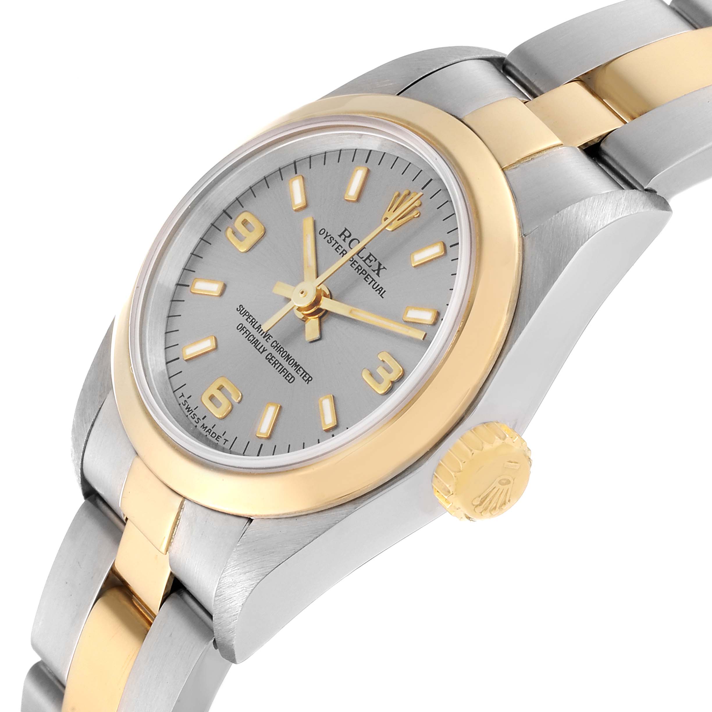 The image shows a side view of a Rolex Oyster Perpetual 67183 Women's Steel and Gold (two tone) Grey Dial 67183 Women's Steel and Gold (two tone) Grey Dial, highlighting its silver and gold bezel and crown.