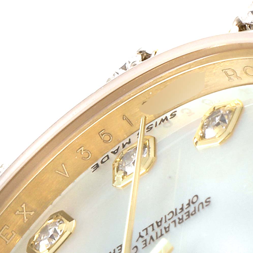 This image shows a close-up of the dial and bezel with diamond hour markers on the Rolex Pearlmaster 80318 Women's Yellow Gold Mother of Pearl Dial 80318 Women's Yellow Gold Mother of Pearl Dial watch.