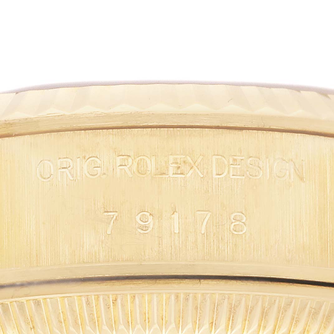 This close-up image shows the engraved inner side of the case back of a Rolex President 79178 Women's Yellow Gold Champagne Dial 79178 Women's Yellow Gold Champagne Dial model watch, including its design number "79178."