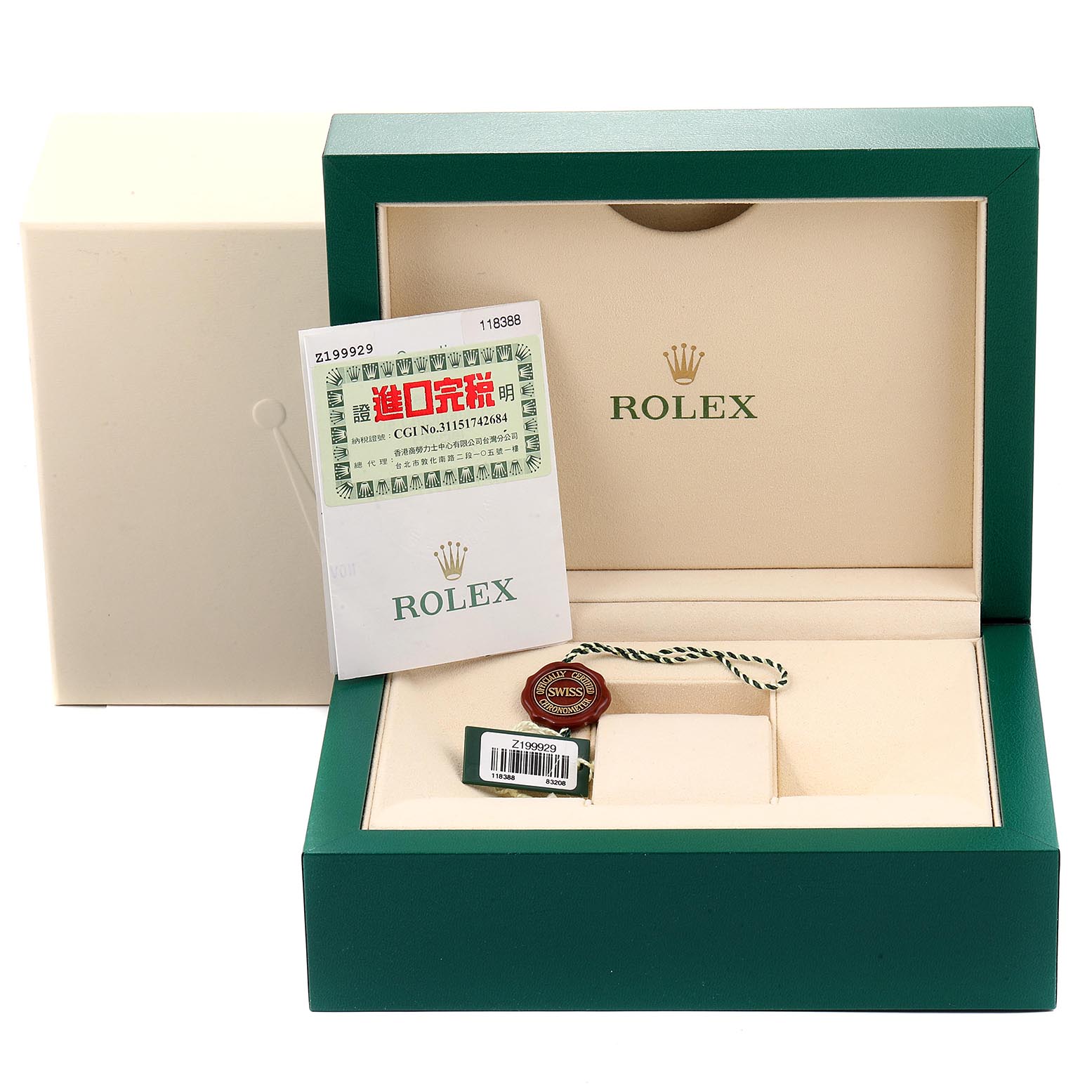 This image shows the open box for a Rolex President 118388 Men
s Yellow Gold Champagne Dial 118388 Men
s Yellow Gold Champagne Dial model watch, including tags and paperwork inside the case.