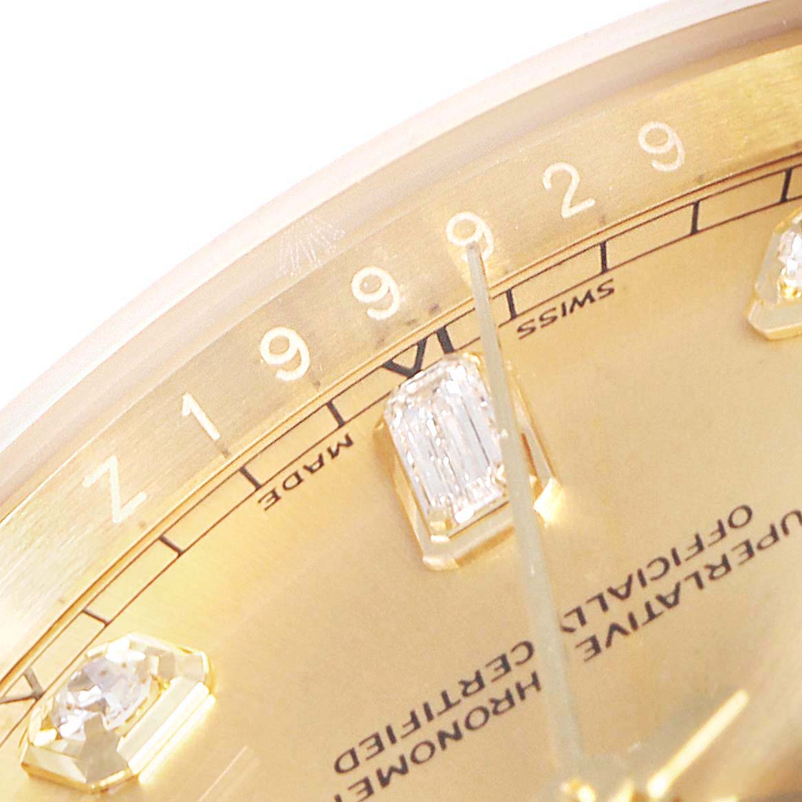 This close-up angle of the Rolex President 118388 Men
s Yellow Gold Champagne Dial 118388 Men
s Yellow Gold Champagne Dial model shows part of the dial, date window, and diamond hour markers.