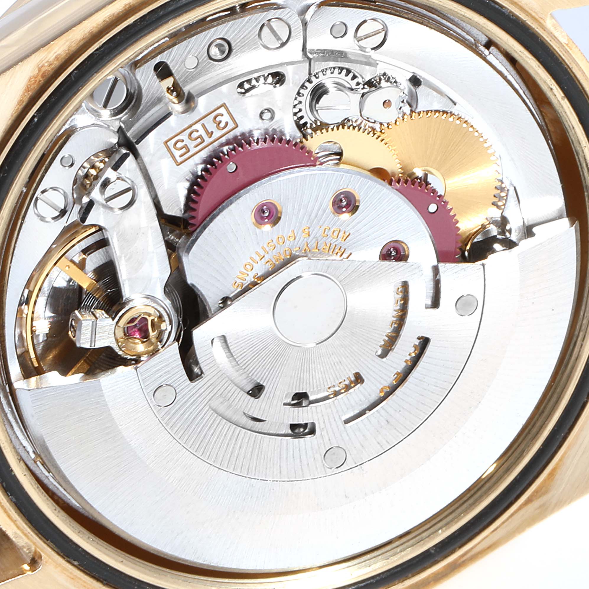 The image shows the internal mechanics and movement parts of the Rolex President 118388 Men
s Yellow Gold Champagne Dial 118388 Men
s Yellow Gold Champagne Dial model watch from a top-down angle.
