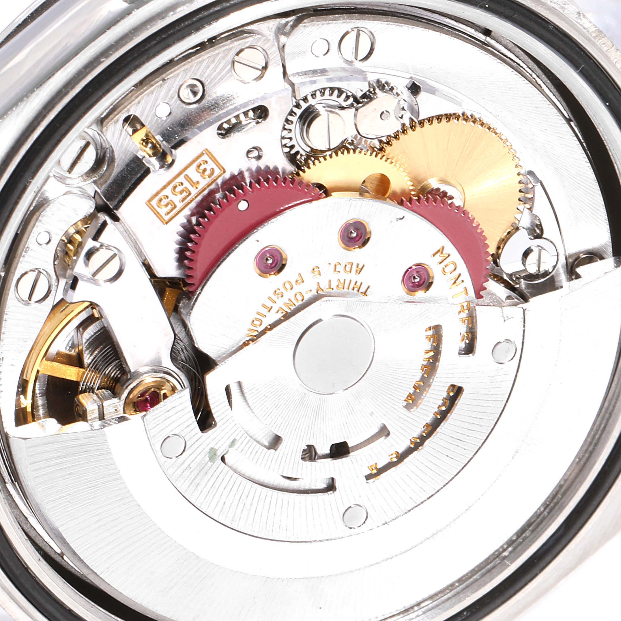 This image shows the internal mechanism of a Rolex President 118206 Men's Platinum Blue Dial 118206 Men's Platinum Blue Dial watch, focusing on the intricate gears and components.