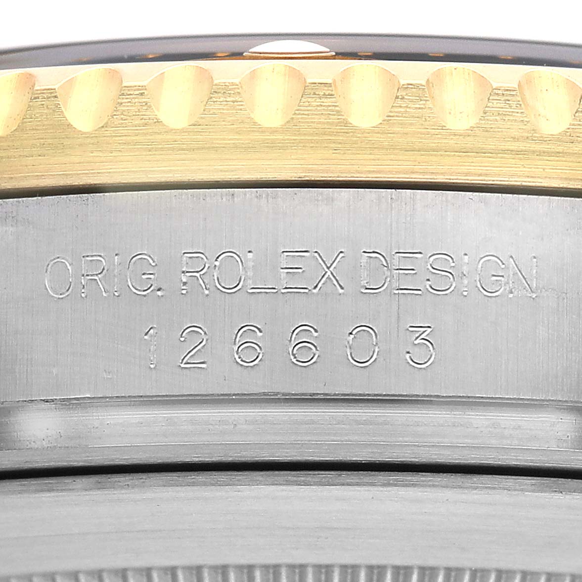 The image shows the side profile of the bezel and case, displaying the model number "126603" of the Rolex Sea-Dweller M126603 Men's Steel and Gold (two tone) Black Dial.