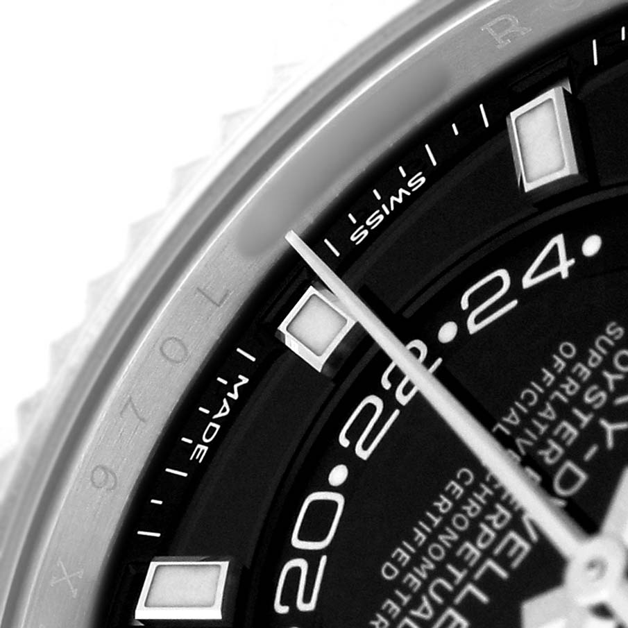 The image shows a close-up of the Rolex Sky-Dweller 326934 Men's Stainless Steel Black Dial watch face, highlighting the hour markers and part of the bezel.