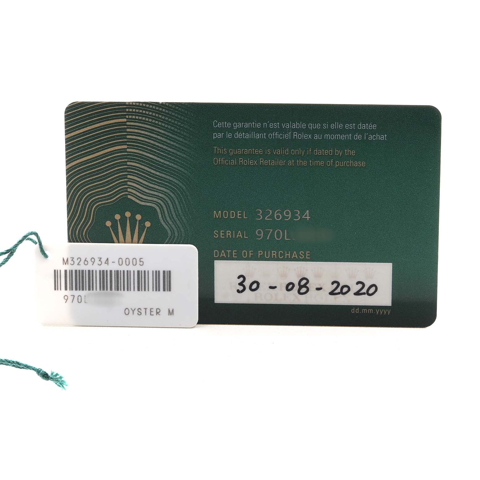 The image shows a Rolex Sky-Dweller 326934 Men's Stainless Steel Black Dial warranty card with model and serial numbers, alongside a barcode tag.
