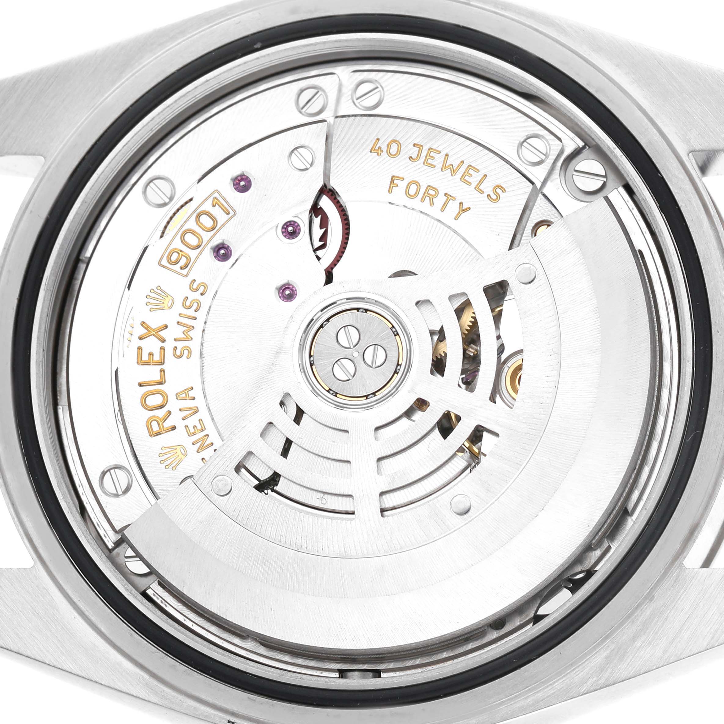 The image shows the movement of a Rolex Sky-Dweller 326934 Men's Stainless Steel Black Dial watch, focusing on its intricate mechanism and rotor.