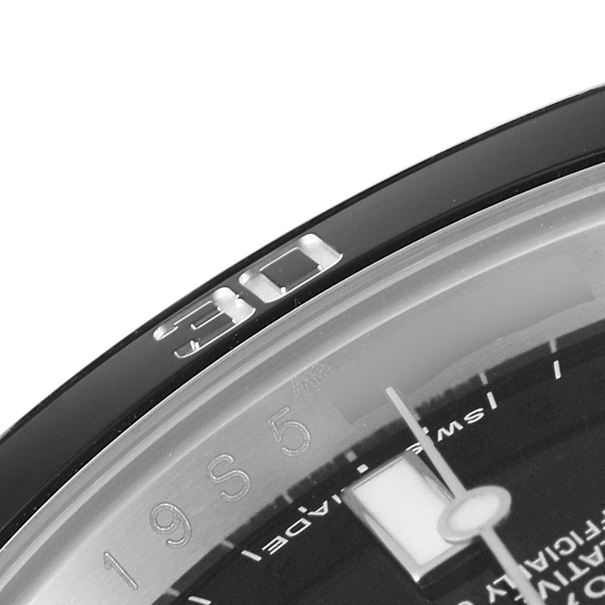This is a close-up angle showing the bezel and a portion of the dial of the Rolex Submariner 114060 Men
s Stainless Steel Black Dial 114060 Men
s Stainless Steel Black Dial watch.