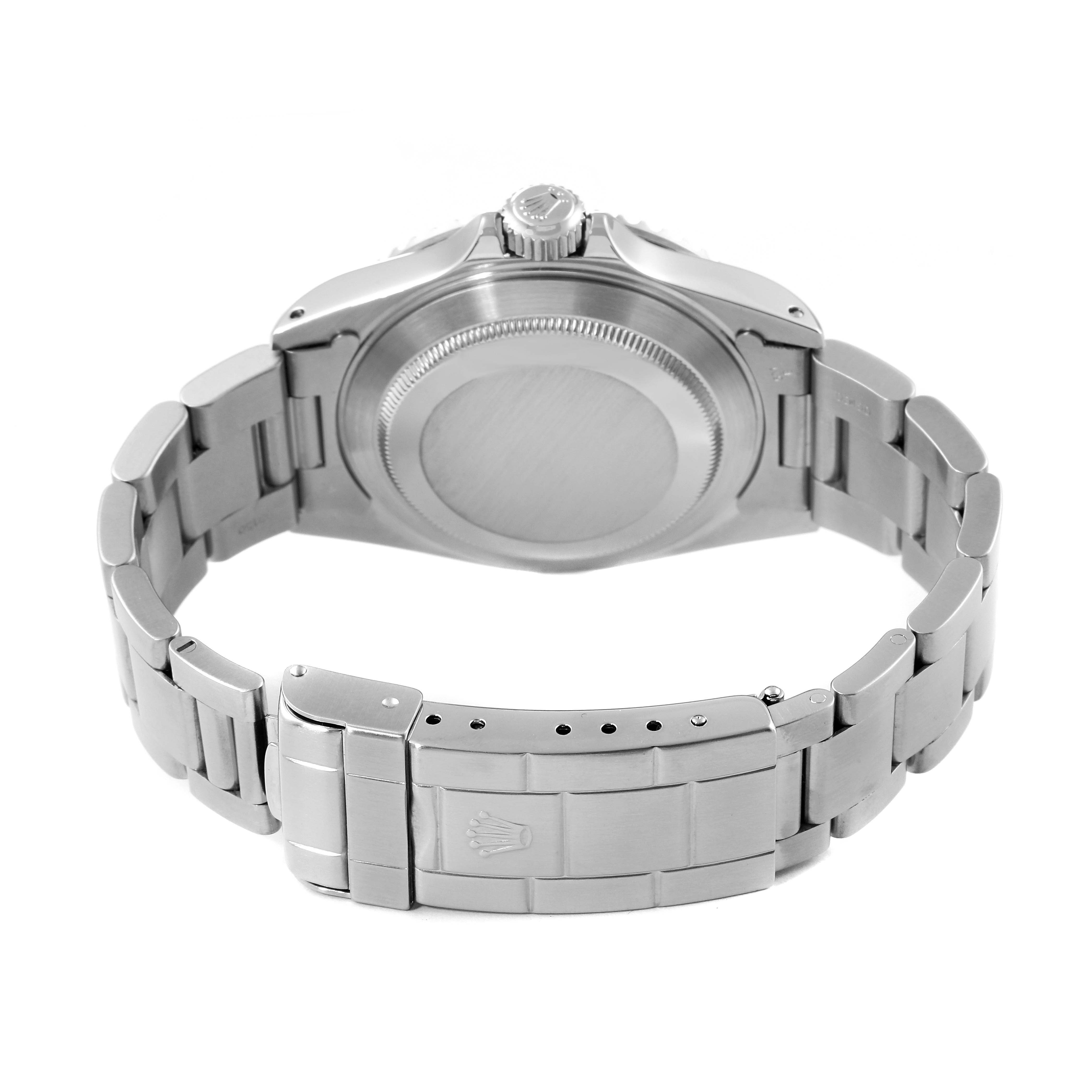 The image shows the backside and bracelet of a Rolex Submariner 14060 Men
s Stainless Steel Black Dial 14060 Men
s Stainless Steel Black Dial watch, highlighting the clasp and case back.