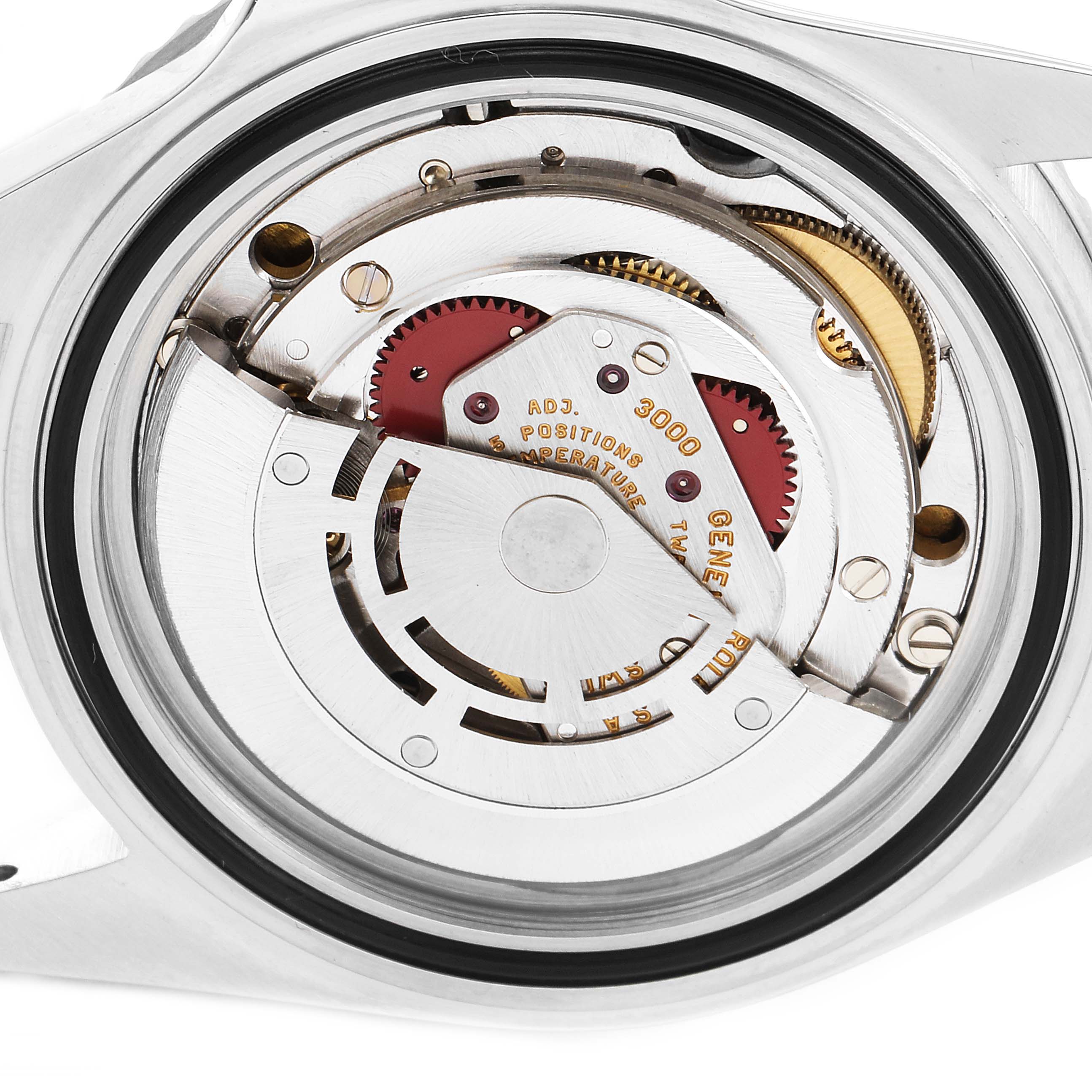 The image shows the internal mechanical movement of a Rolex Submariner 14060 Men
s Stainless Steel Black Dial 14060 Men
s Stainless Steel Black Dial watch from the back.