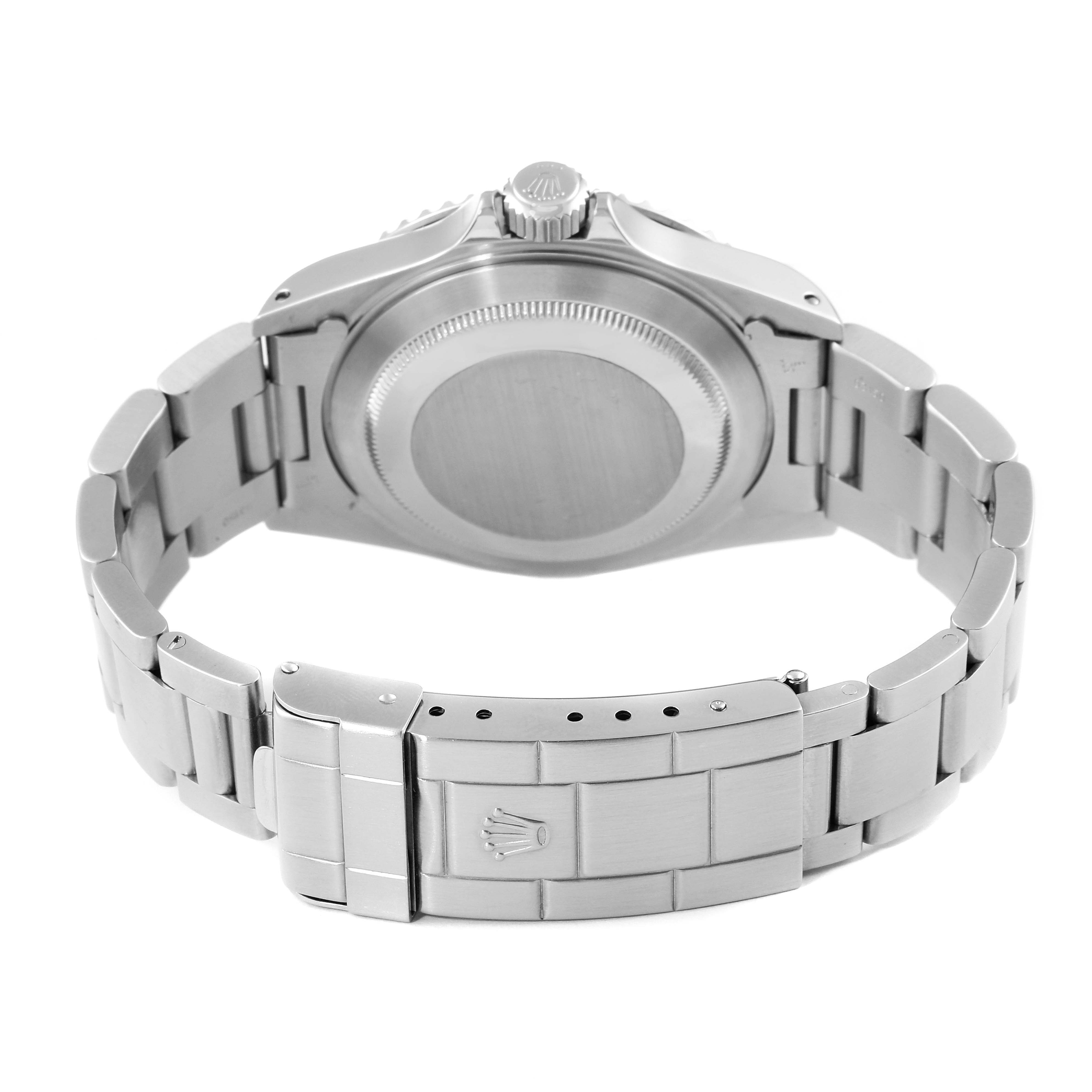 The image depicts the back view of a Rolex Submariner 14060 Men
s Stainless Steel Black Dial 14060 Men
s Stainless Steel Black Dial watch, showing the case back, bracelet, and clasp.