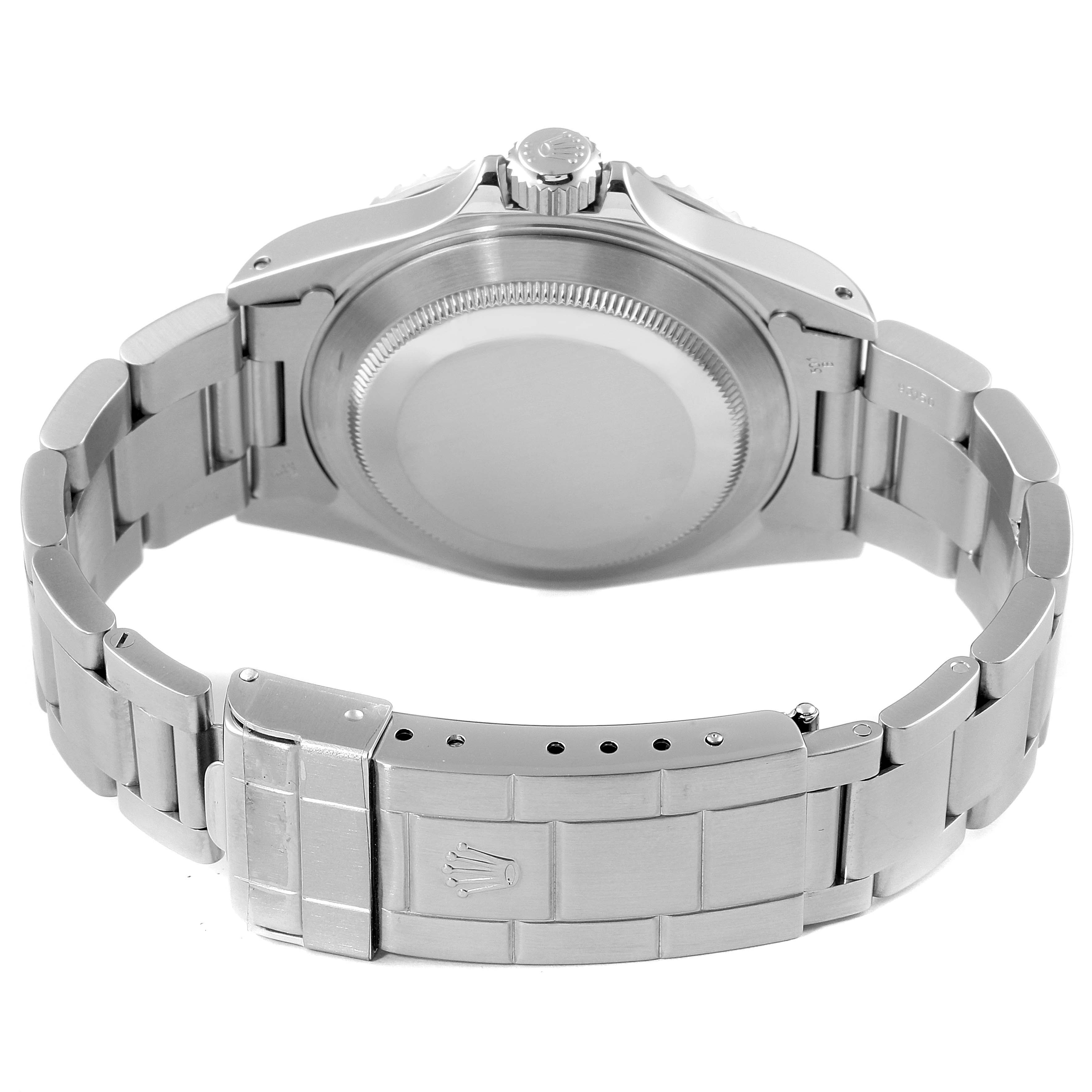 The image shows the backside and bracelet clasp of a Rolex Submariner 14060 Men
s Stainless Steel Black Dial 14060 Men
s Stainless Steel Black Dial watch.