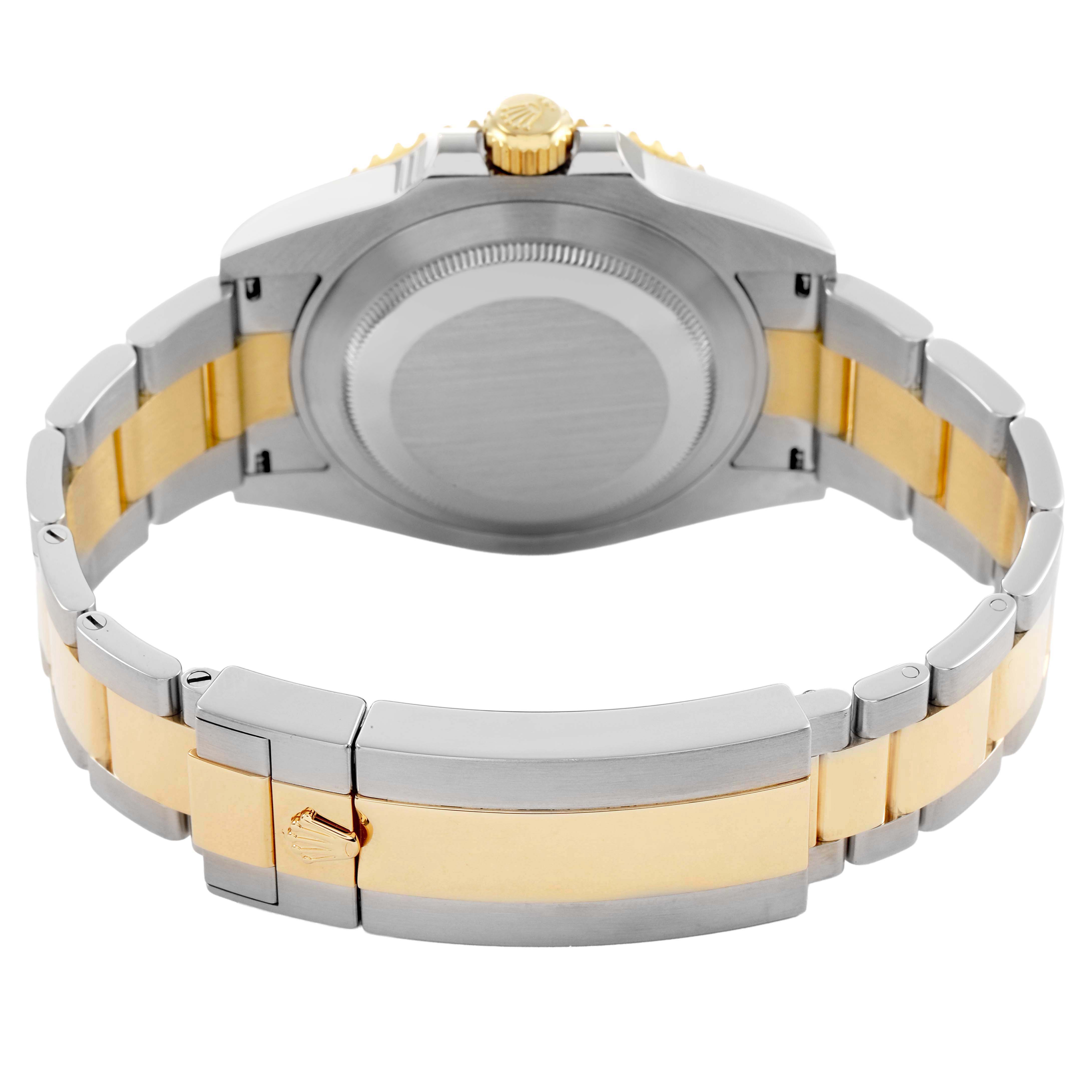 The image shows the back of a Rolex Submariner 126613 Men's Steel and Gold (two tone) Blue Dial watch, highlighting the case back and two-tone bracelet.