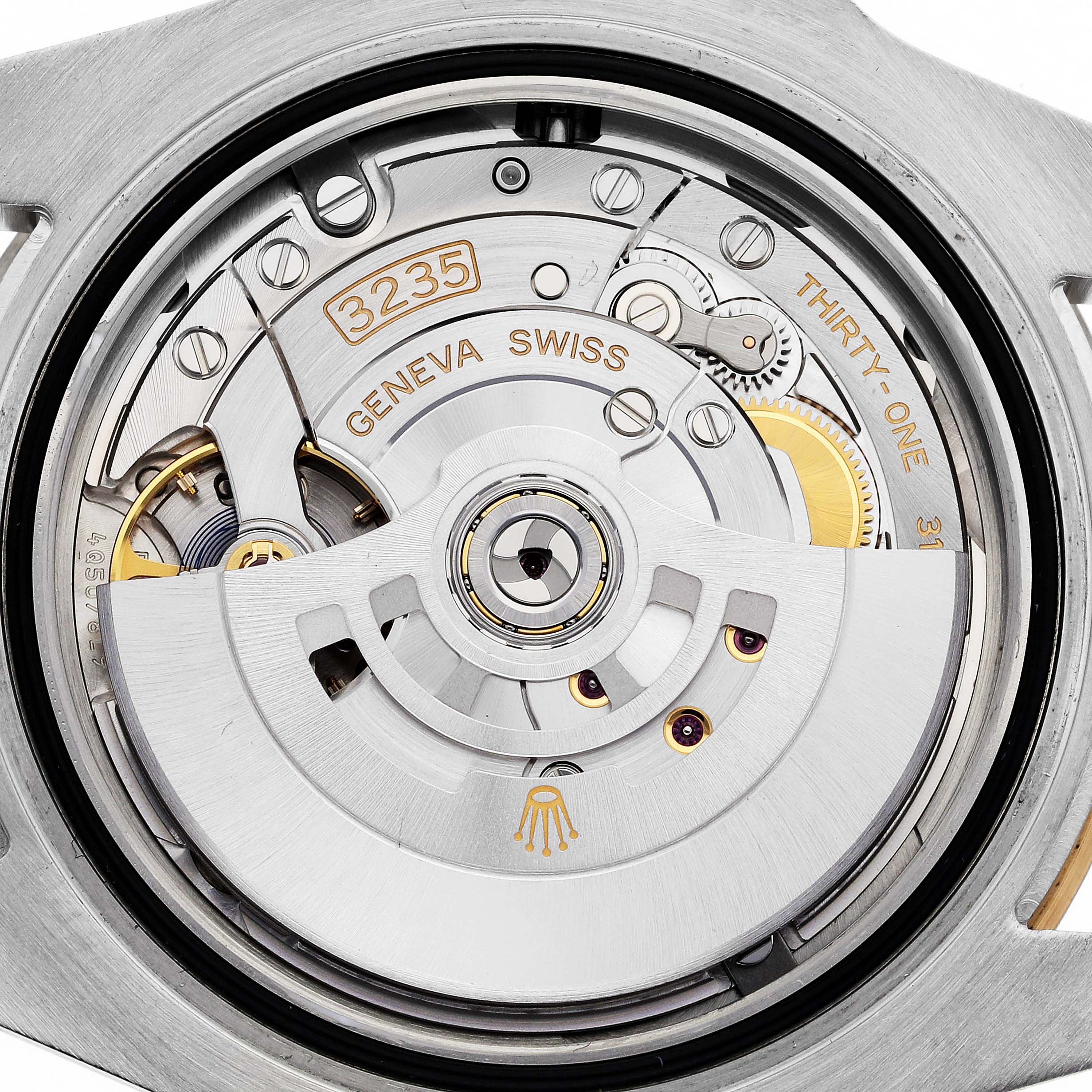 The image shows the movement of the Rolex Submariner 126613 Men's Steel and Gold (two tone) Blue Dial 126613 Men's Steel and Gold (two tone) Blue Dial watch, highlighting its intricate gears and rotor mechanism from a top-down angle.