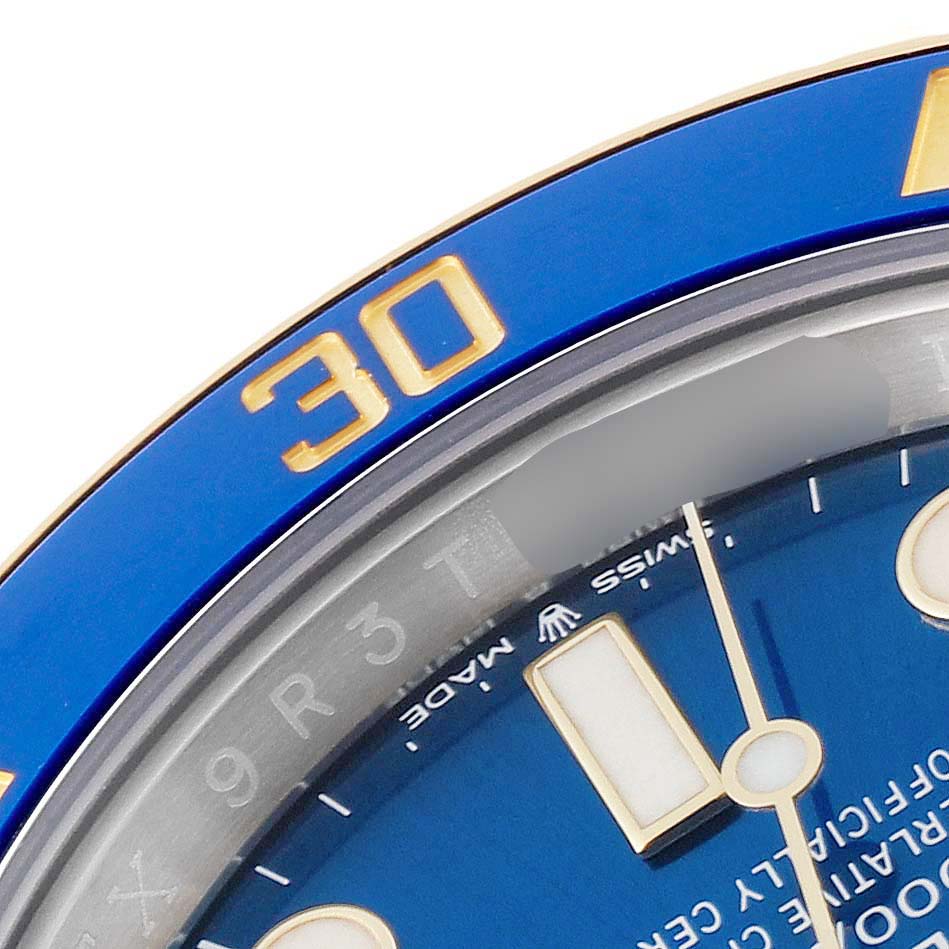 The image shows a close-up of the blue dial and bezel with the '30' minute marker of a Rolex Submariner 126613 Men's Steel and Gold (two tone) Blue Dial 126613 Men's Steel and Gold (two tone) Blue Dial watch.