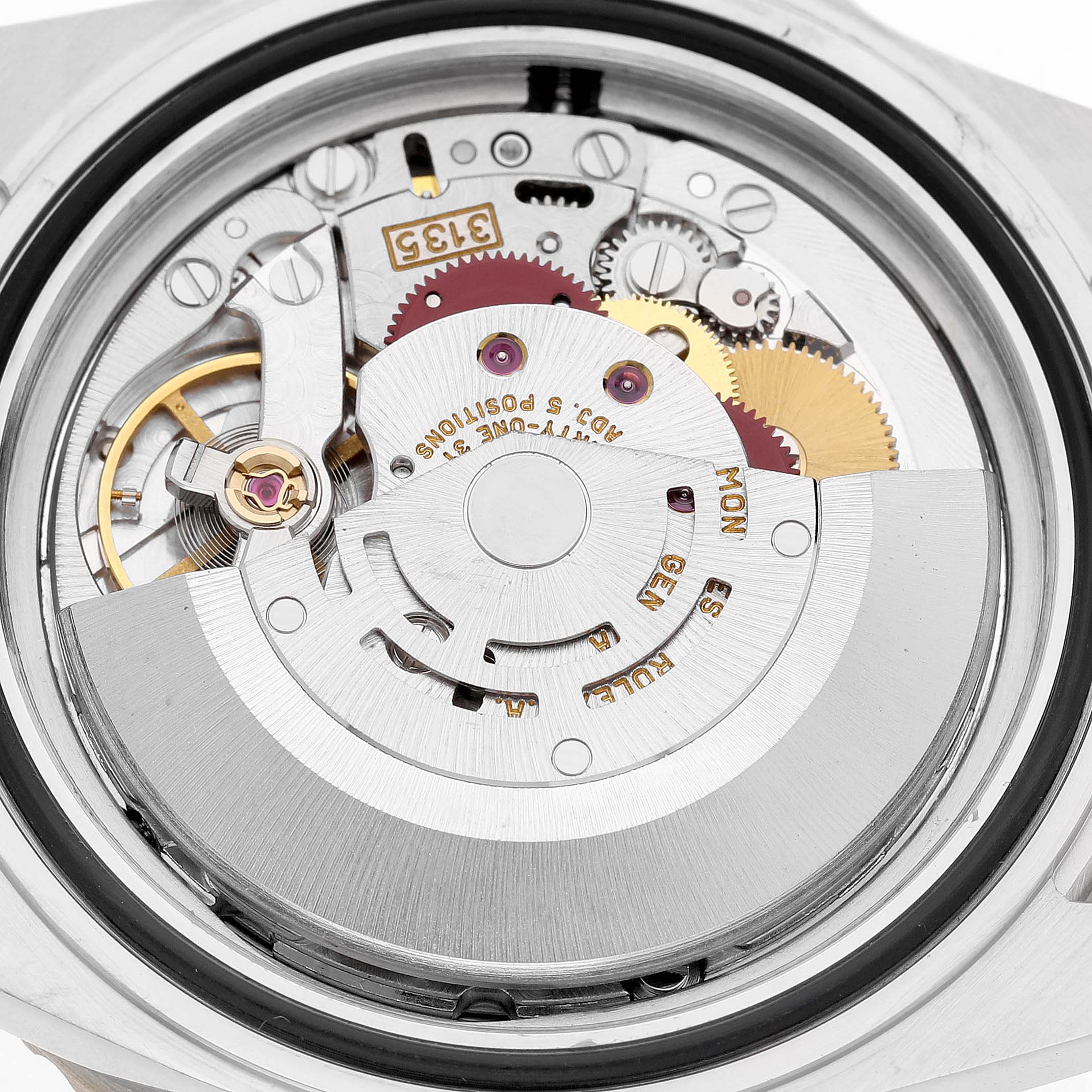 The image shows an interior movement view of a Rolex Submariner 16613 Men's Steel and Gold (two tone) Champagne Dial, highlighting gears and the rotor mechanism.