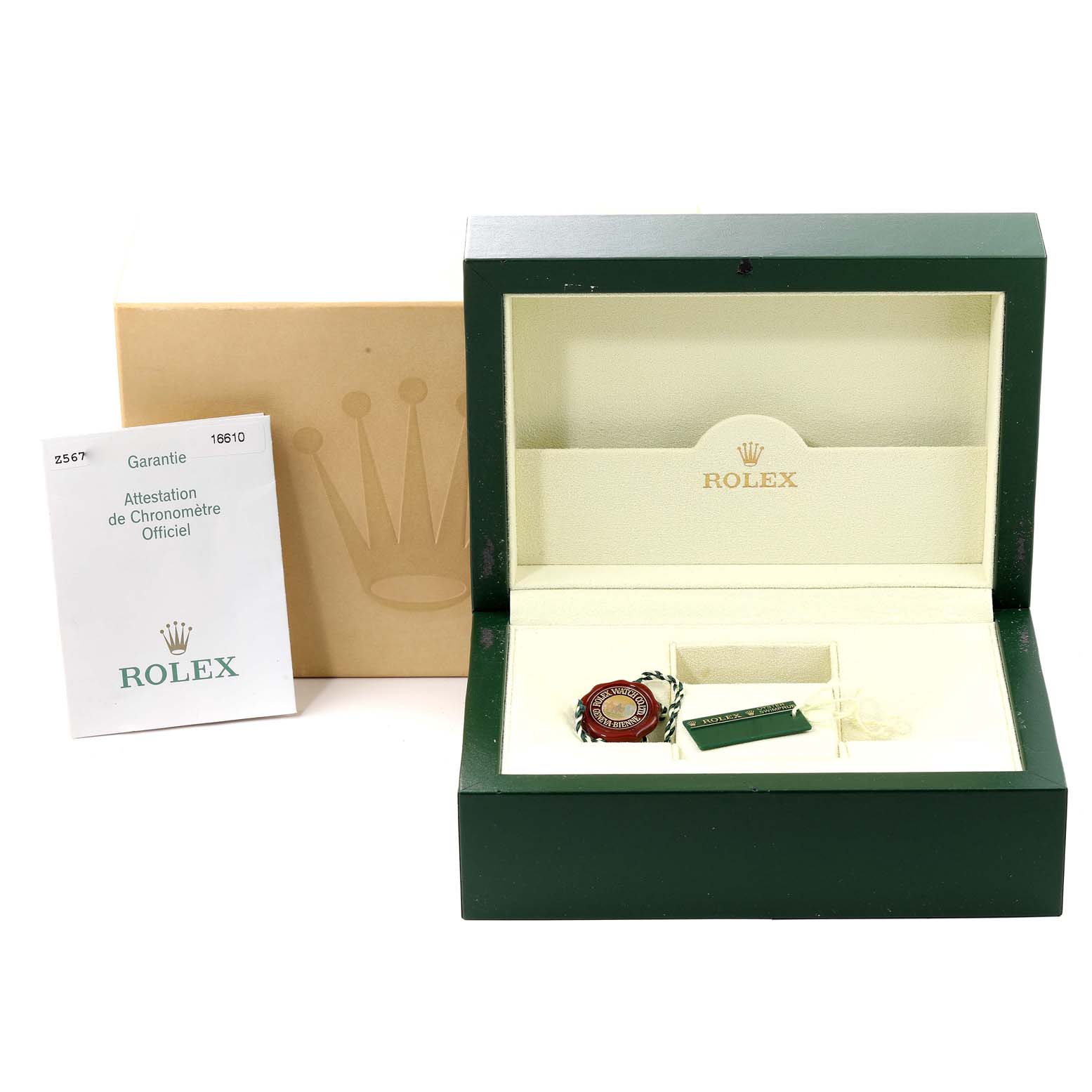 The image shows an open Rolex box for a Submariner model, an outer box, a warranty card, and tags.