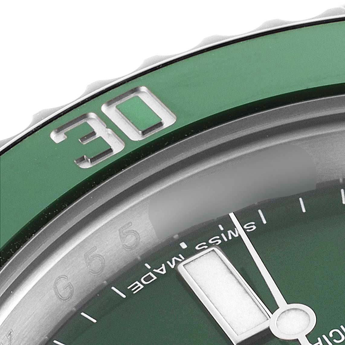 A close-up view of the Rolex Submariner 116610LV Men
s Stainless Steel Green Dial 116610LV Men
s Stainless Steel Green Dial
s green bezel, hour hand, and part of the dial.