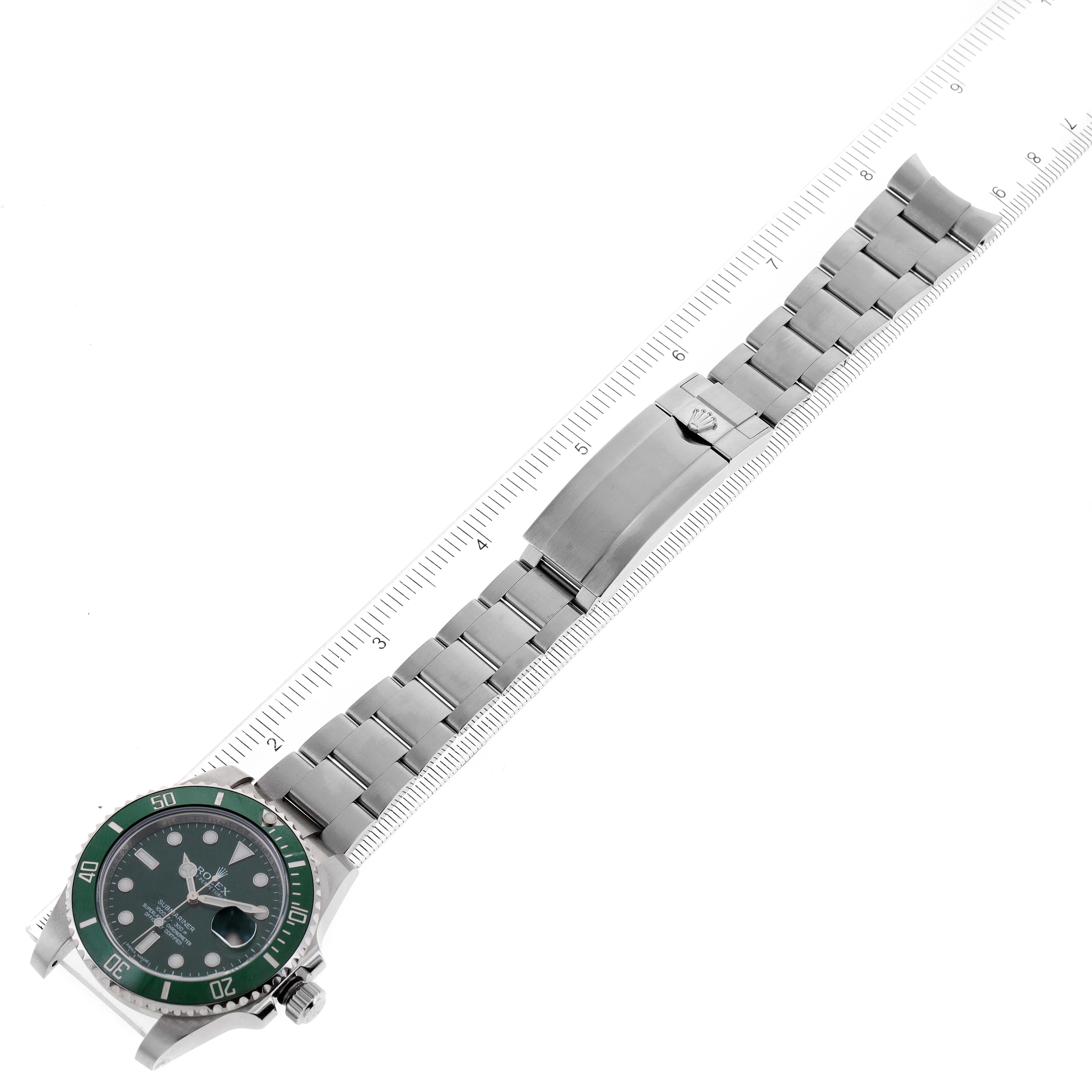 The image shows an angled top view of a Rolex Submariner 116610LV Men
s Stainless Steel Green Dial 116610LV Men
s Stainless Steel Green Dial watch, highlighting the full band and the face with a green bezel.