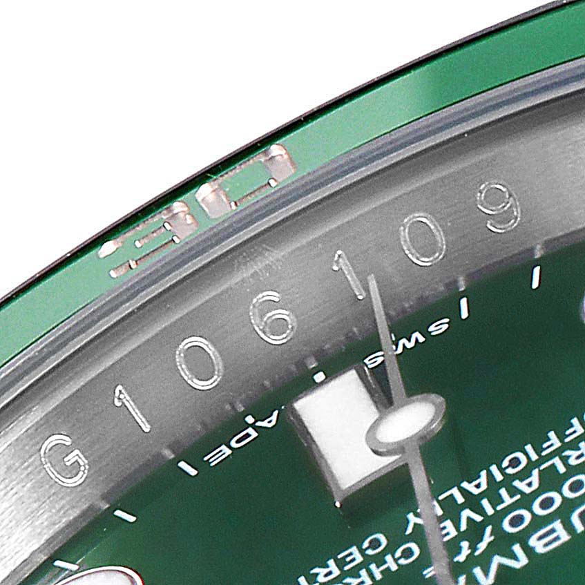 This image shows a close-up of the serial number on the rehaut and part of the dial of a Rolex Submariner 116610LV Men's Stainless Steel Green Dial 116610LV Men's Stainless Steel Green Dial watch.