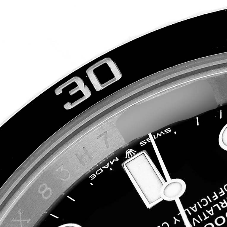 The image shows a close-up of the bezel and part of the dial of a Rolex Submariner 126610 Men's Stainless Steel Black Dial, focusing on the 30-minute mark.