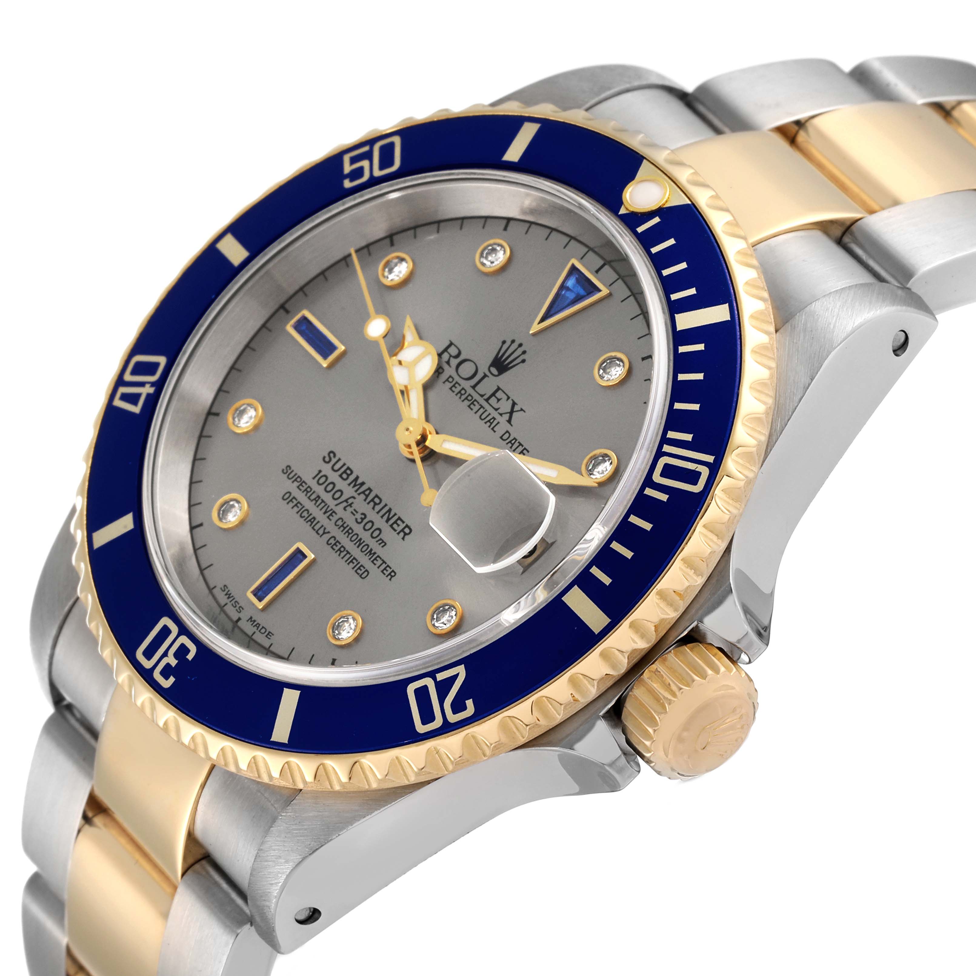 The image shows a Rolex Submariner 16613 Men's Steel and Gold (two tone) Grey Dial 16613 Men's Steel and Gold (two tone) Grey Dial from an angled side view, highlighting its bezel, crown, and part of the bracelet.