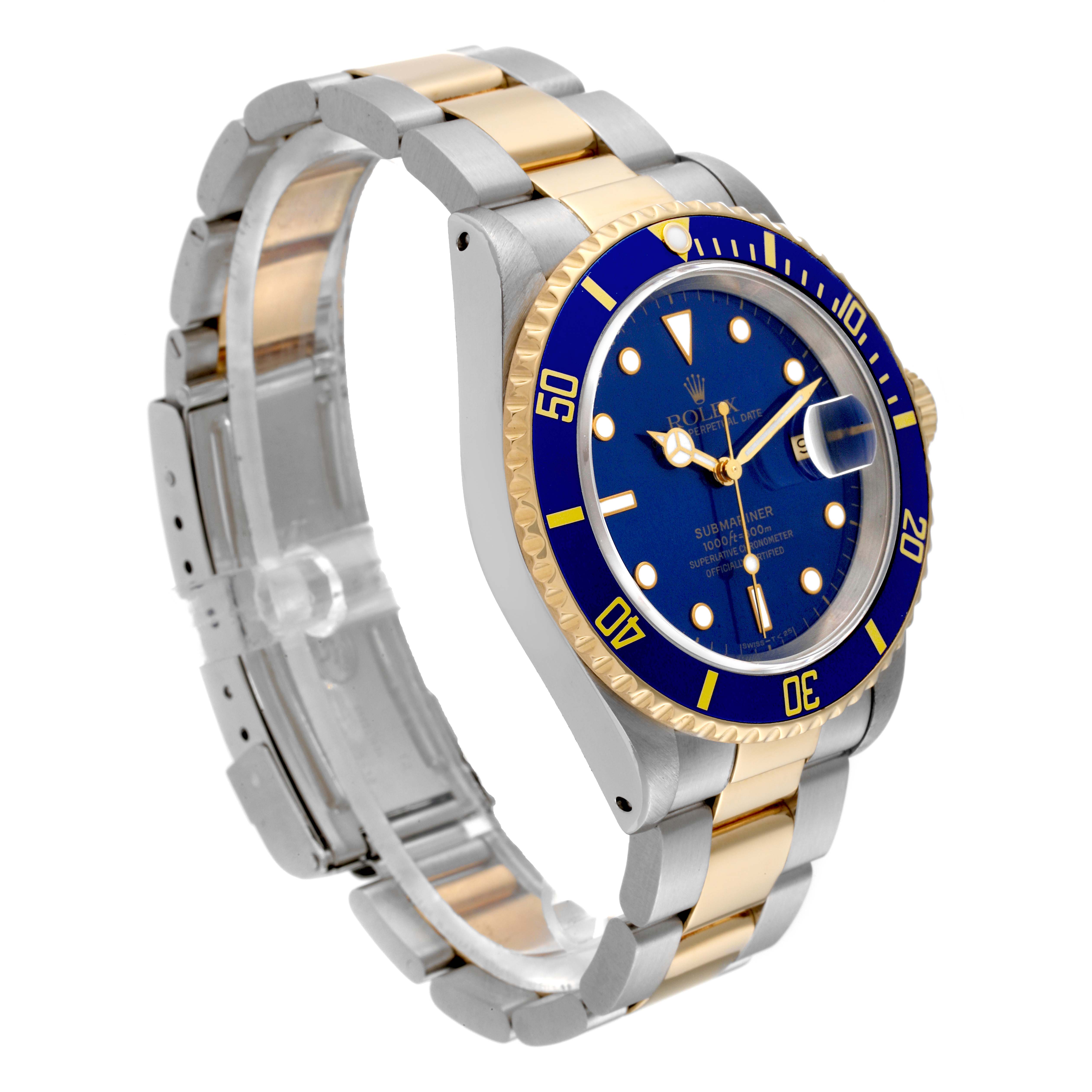 This image shows a Rolex Submariner 16613 Men's Steel and Gold (two tone) Blue Dial 16613 Men's Steel and Gold (two tone) Blue Dial watch at a 3/4 angle, highlighting its blue dial, bezel, and two-tone bracelet.