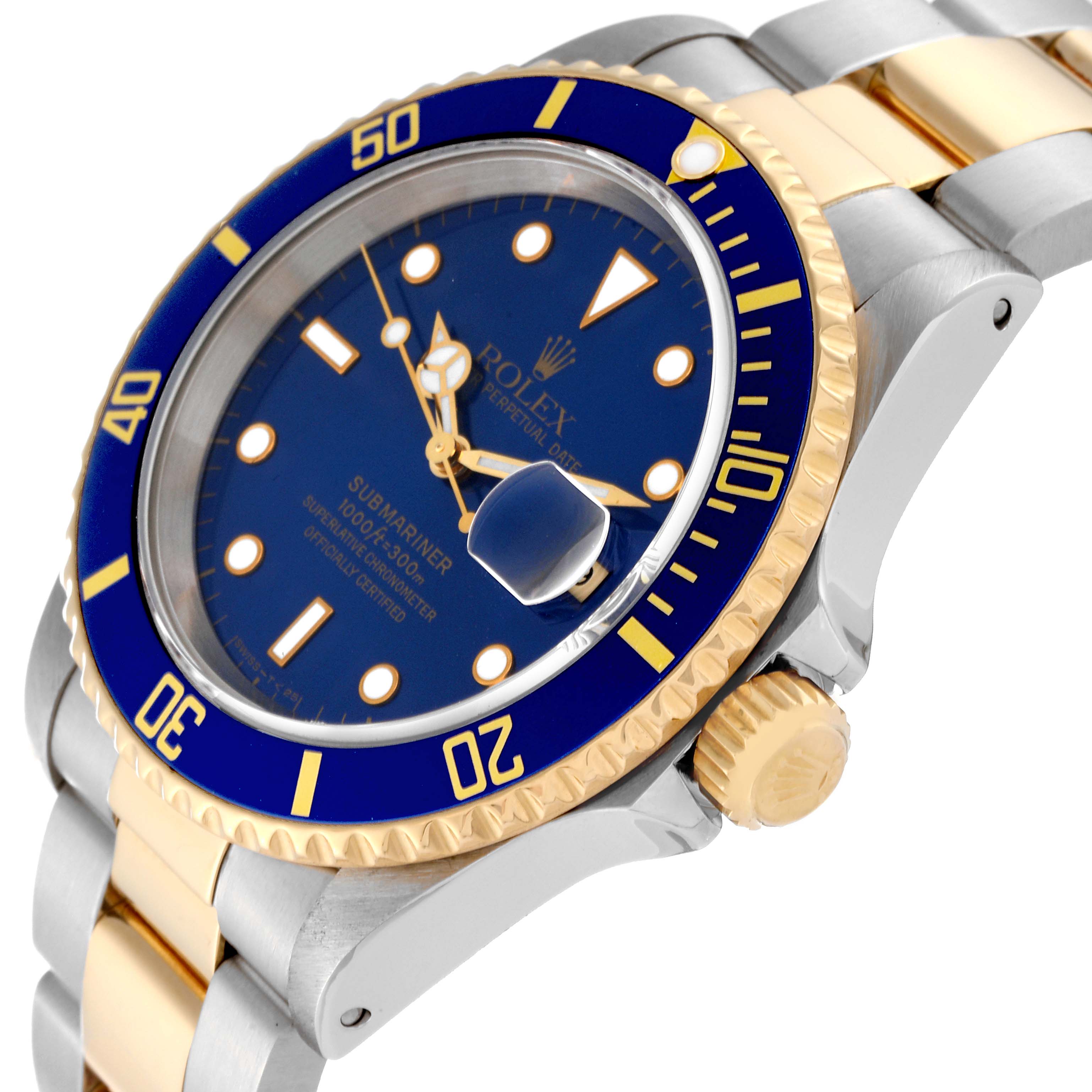 The image shows a close-up angle of a Rolex Submariner 16613 Men's Steel and Gold (two tone) Blue Dial 16613 Men's Steel and Gold (two tone) Blue Dial watch, highlighting its blue dial, gold bezel, and part of its two-tone bracelet.