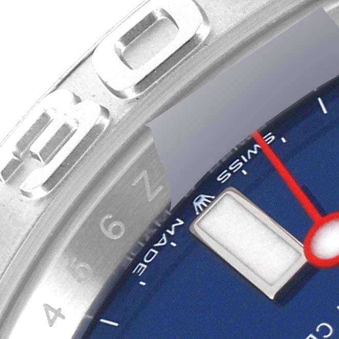 Close-up of the Rolex Yacht-Master 126622 Men's Stainless Steel Blue Dial 126622 Men's Stainless Steel Blue Dial watch showing part of the bezel, blue dial, and the minute hand.