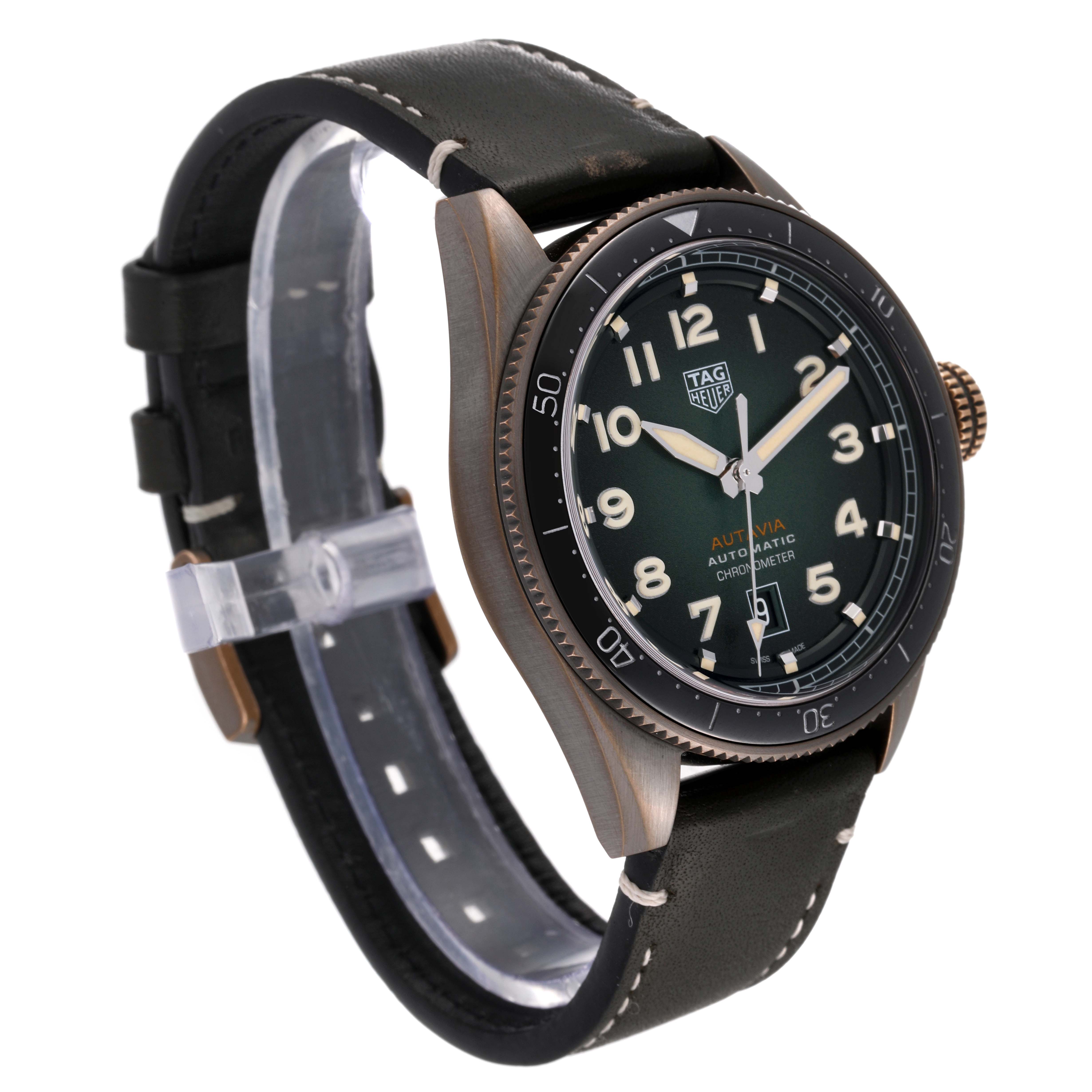 The image shows an angled view of the Tag Heuer Autavia WBE5190.FC8268 Men's Bronze Green Dial WBE5190.FC8268 Men's Bronze Green Dial model, displaying its dial, bezel, case, and strap.