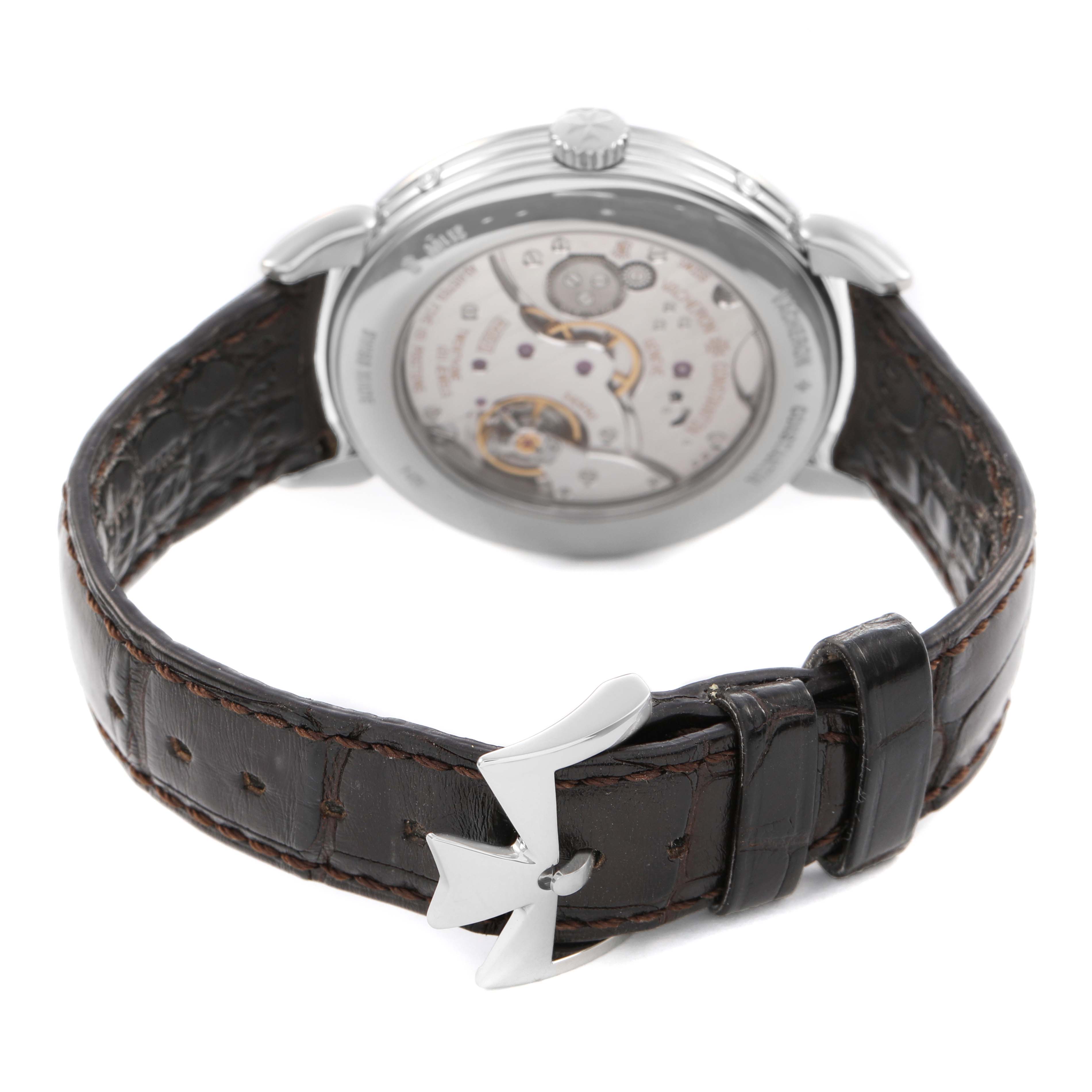 The Vacheron Constantin Historiques 3110V Men's Stainless Steel Silver Dial watch is shown from the back, highlighting the movement and leather strap with a buckle.
