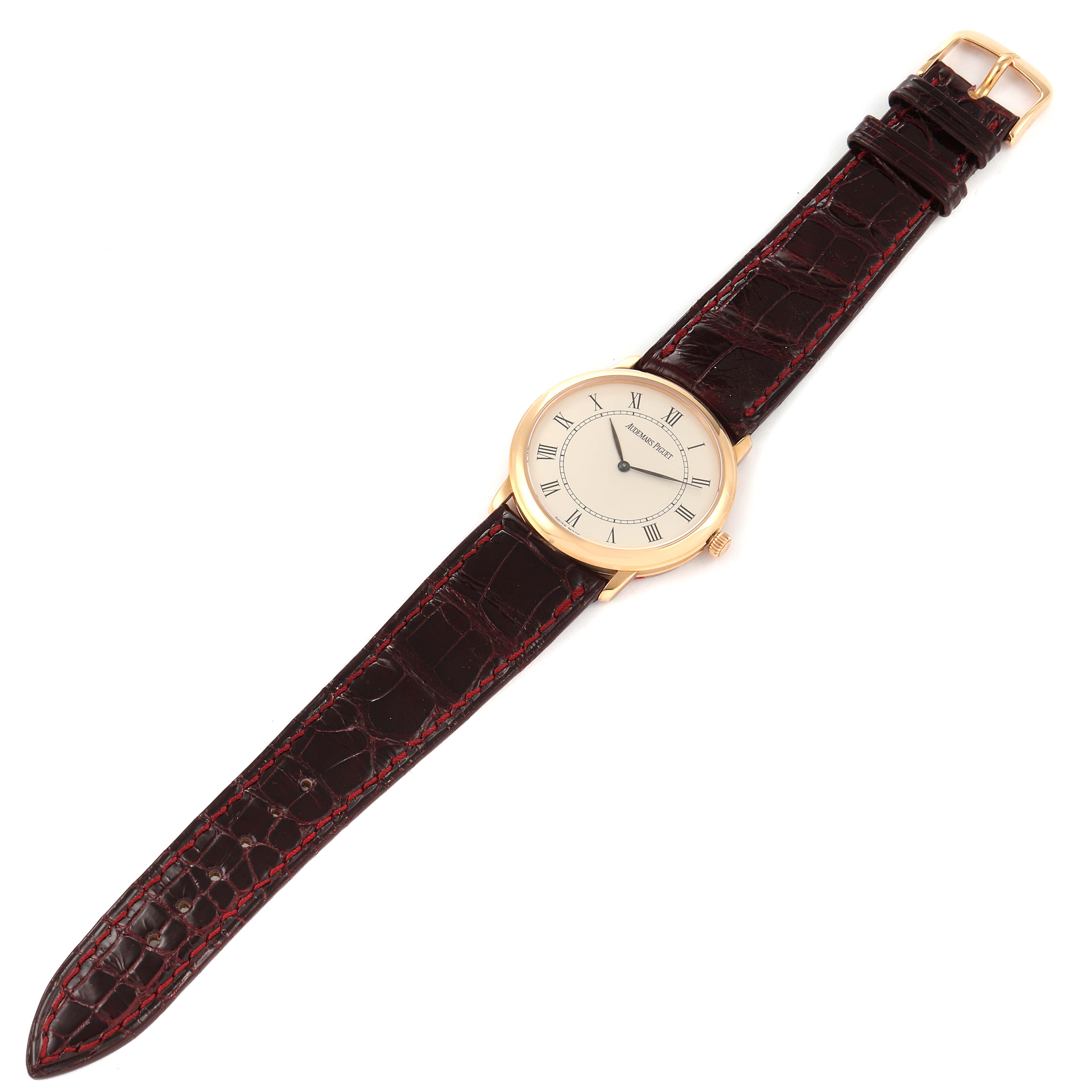 The image shows a top-down view of the Audemars Piguet Jules 148940R/0/0067CR/02 Men's Rose Gold Silver Dial 148940R/0/0067CR/02 Men's Rose Gold Silver Dial watch, highlighting the dial, case, and leather strap.