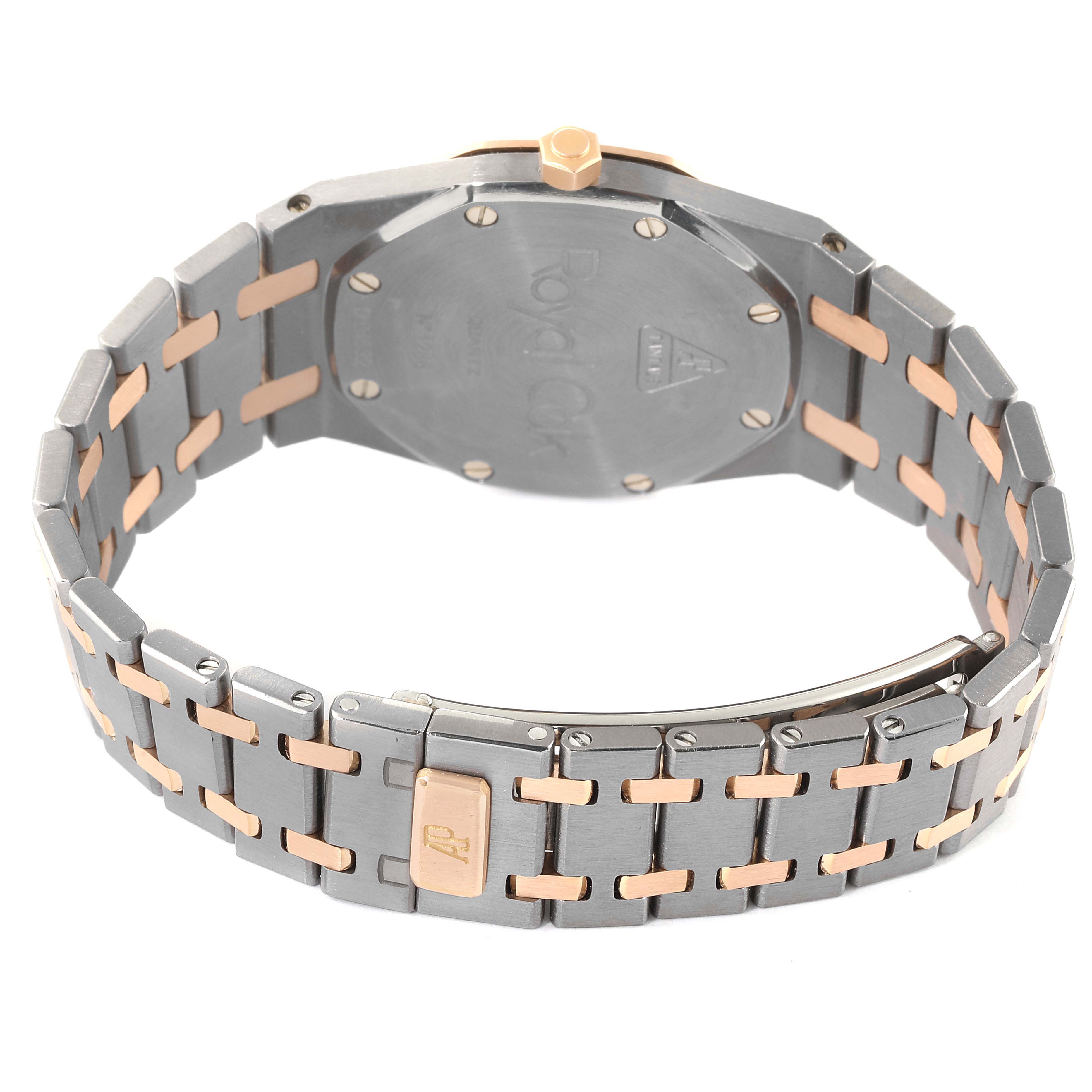 The image shows the back side and bracelet of the Audemars Piguet Royal Oak 56175TR-OO-0789TR-01 Men's Steel and Gold (two tone) Black Dial 56175TR-OO-0789TR-01 Men's Steel and Gold (two tone) Black Dial watch in a close-up shot.