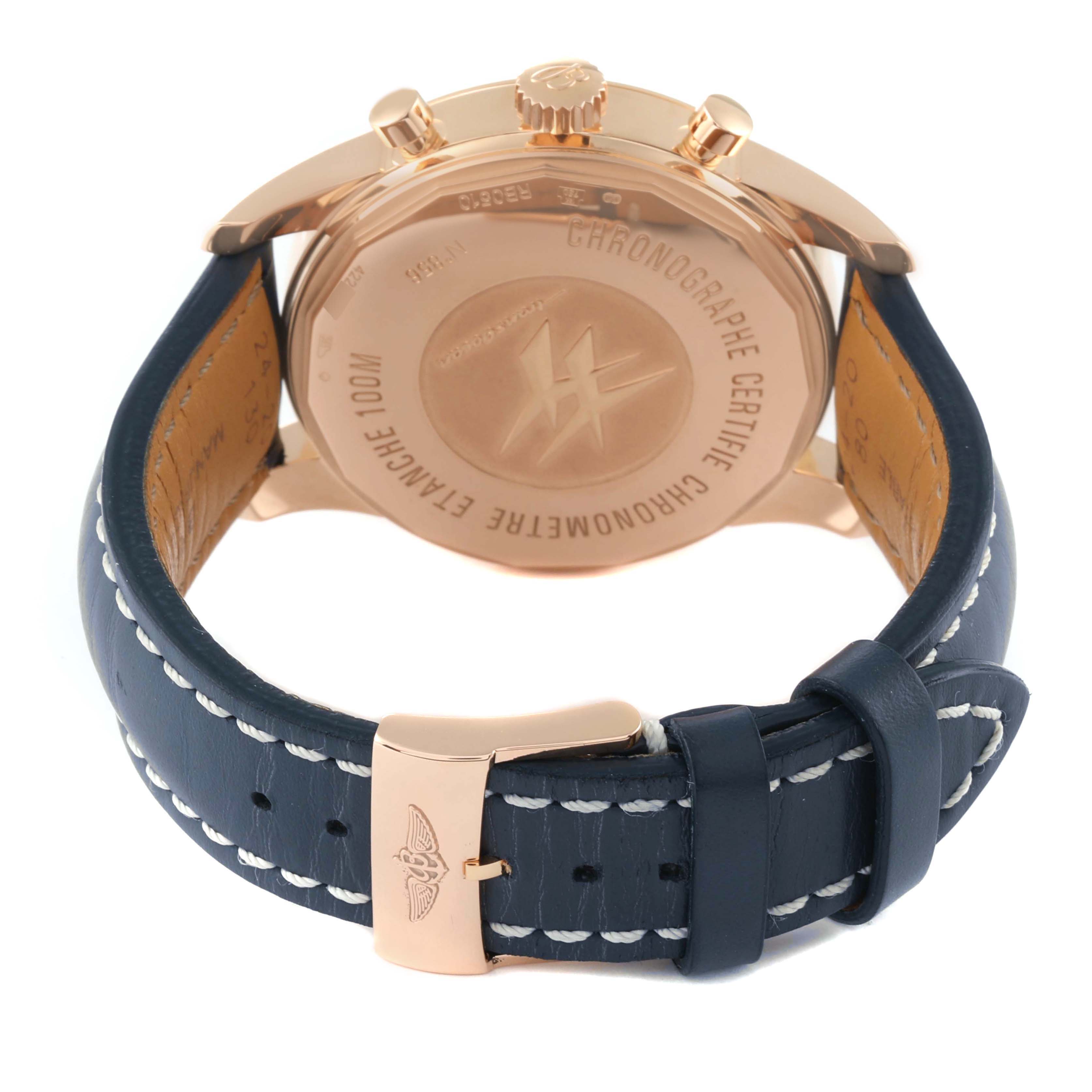 The image shows the back view of a Breitling Transocean RB0510 Men's Rose Gold Blue Dial RB0510 Men's Rose Gold Blue Dial model watch with a blue leather strap and rose gold case.