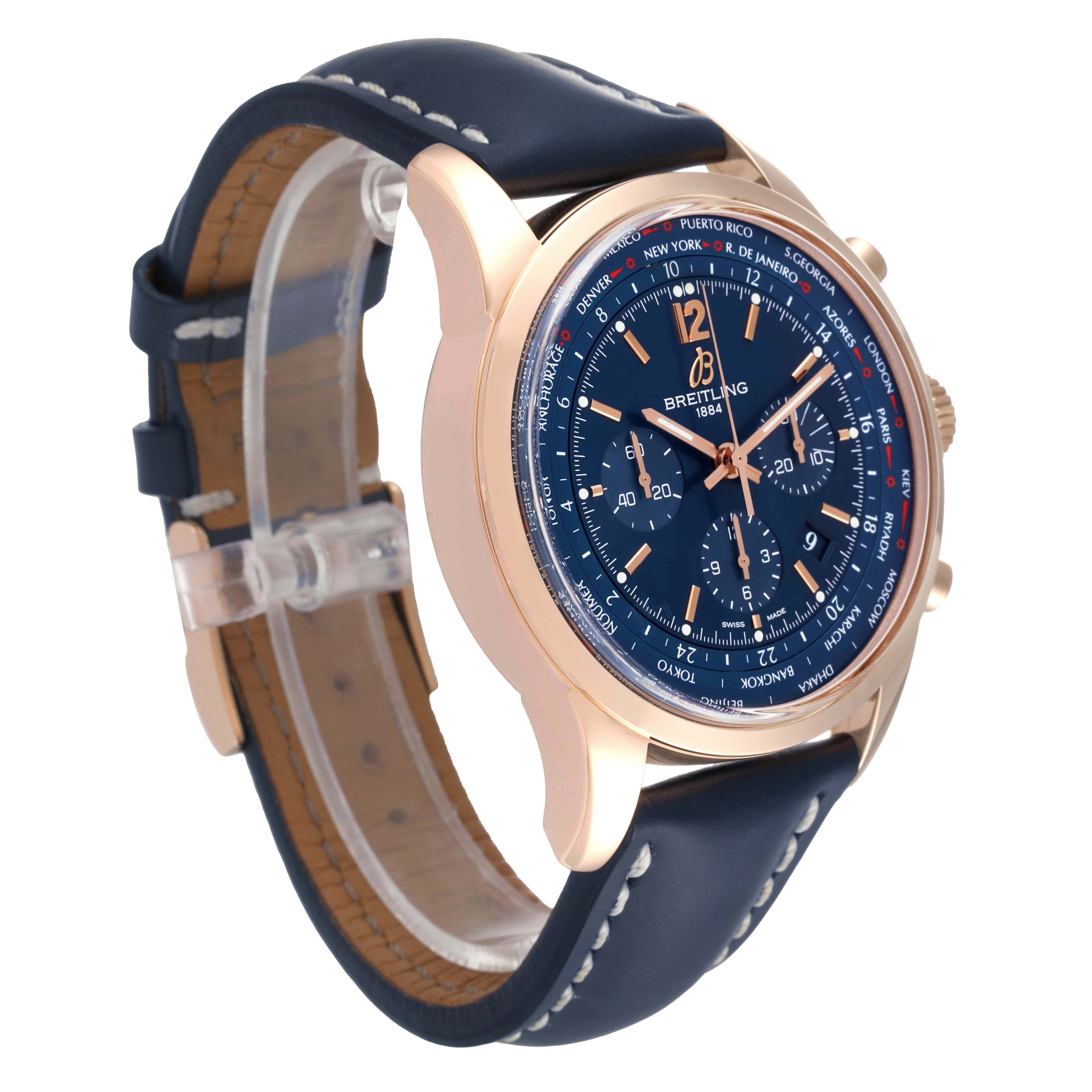 The Breitling Transocean RB0510 Men's Rose Gold Blue Dial RB0510 Men's Rose Gold Blue Dial watch is shown at a 3/4 angle, displaying its blue dial, rose gold case, and navy leather strap.