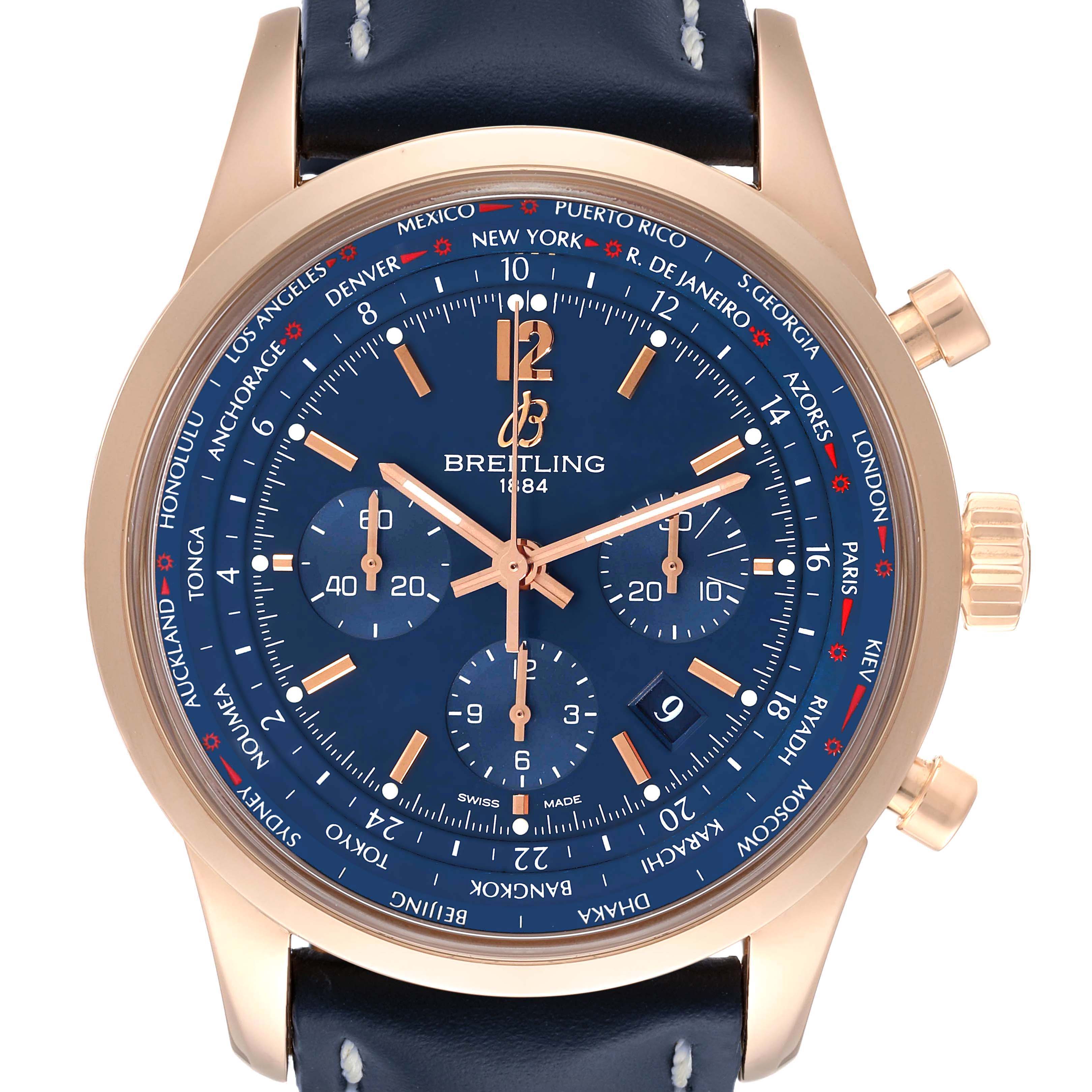 The image shows a front view of the Breitling Transocean RB0510 Men's Rose Gold Blue Dial RB0510 Men's Rose Gold Blue Dial watch displaying its blue dial, gold-tone hands, and chronograph sub-dials.